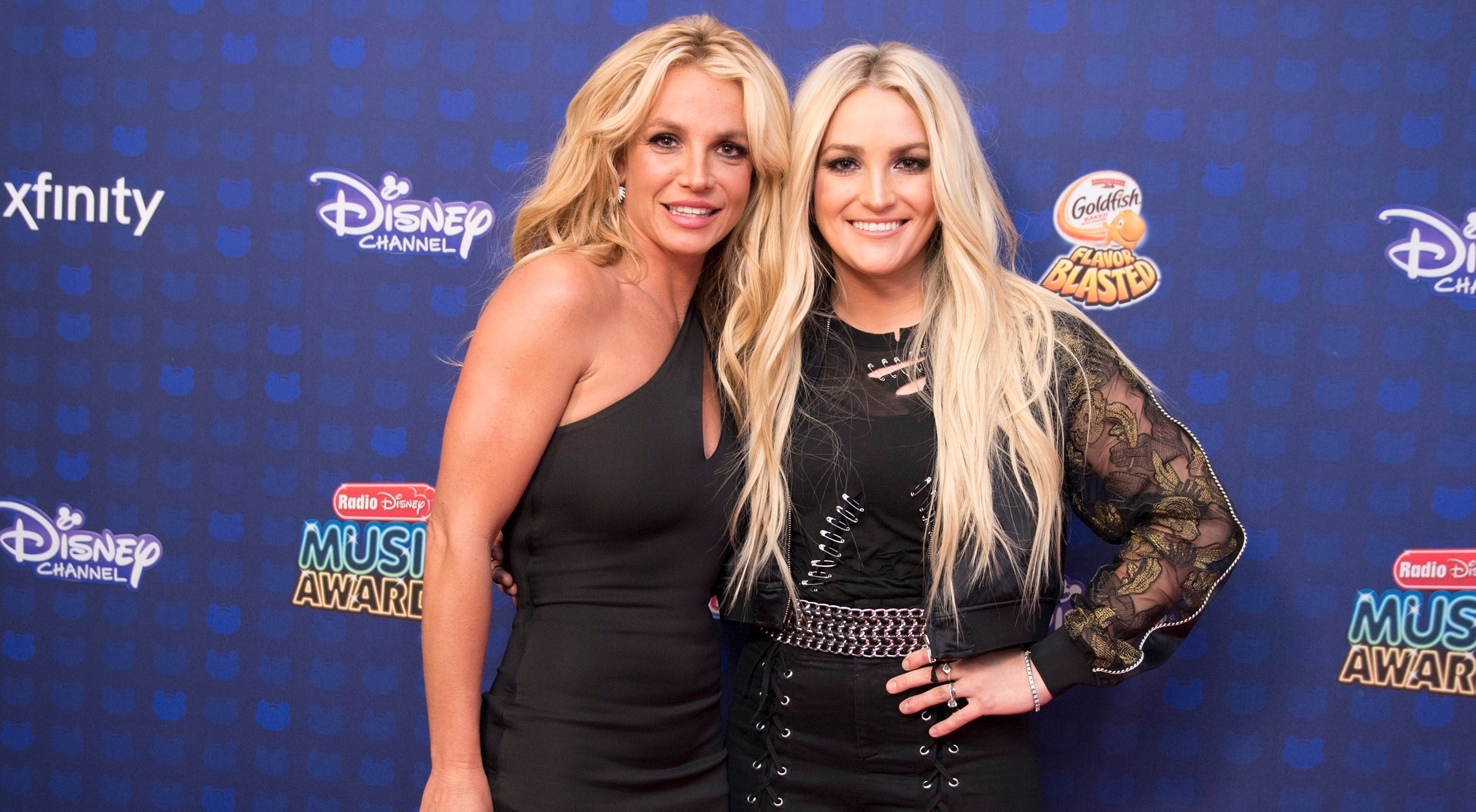 Britney Spears and sister Jamie Lynn Spears smile together at the 2017 Radio Disney Music Awards.