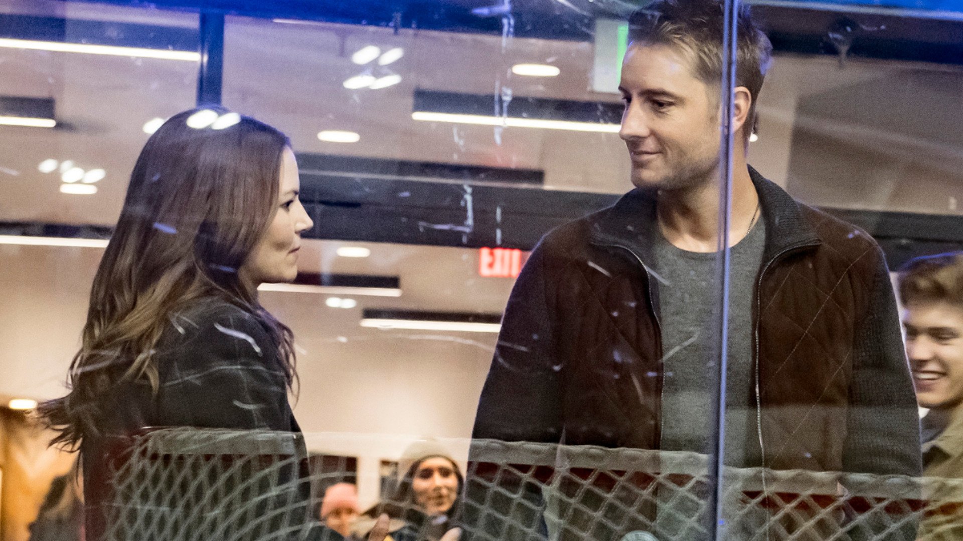 Jennifer Morrison as Cassidy and Justin Hartley as Kevin talk together in an ice arena in ‘This Is Us’ Season 4 Episode 5