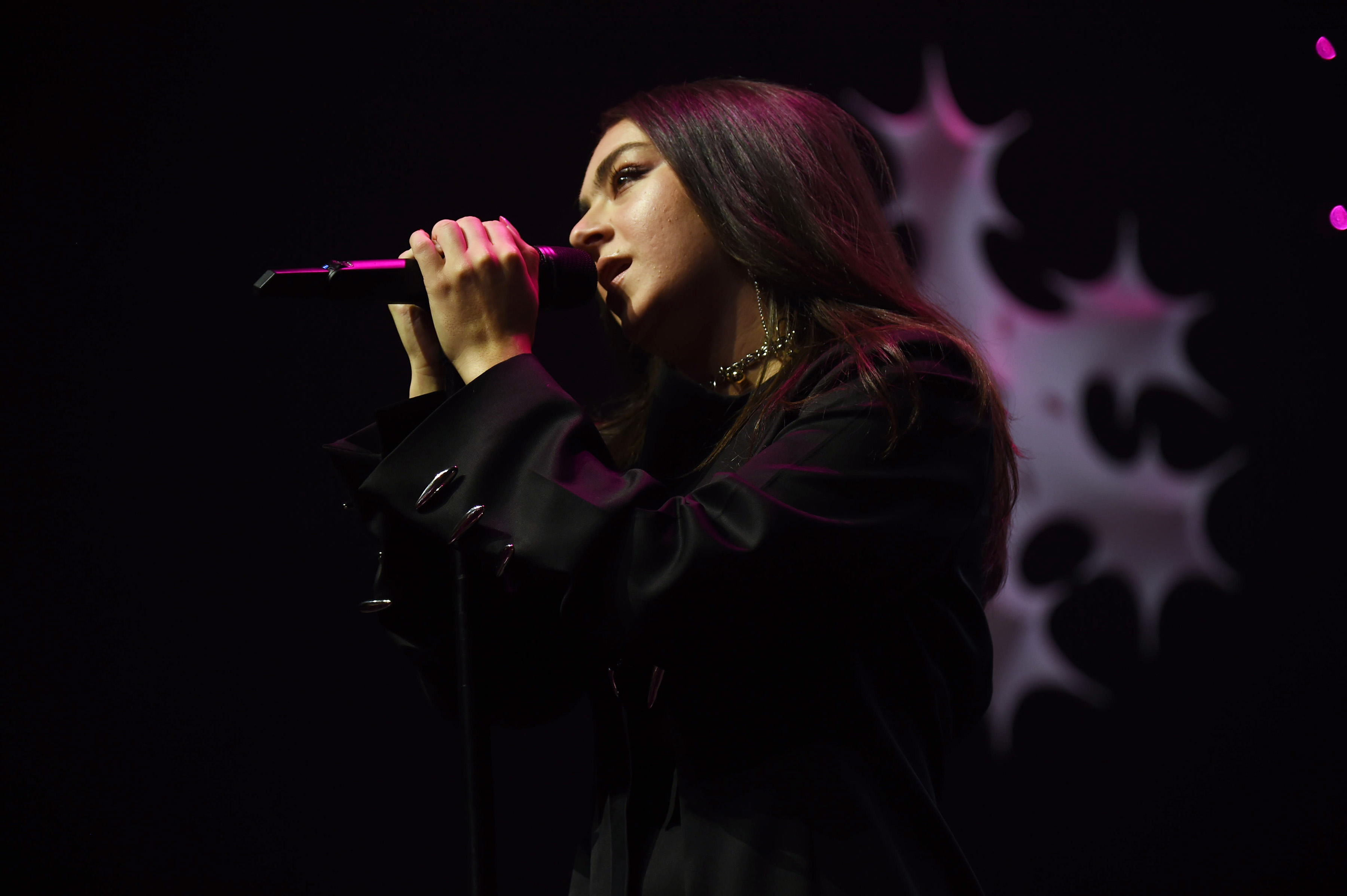 Charli XCX performs on stage during the iHeartRadio Z100 Jingle Ball 2021