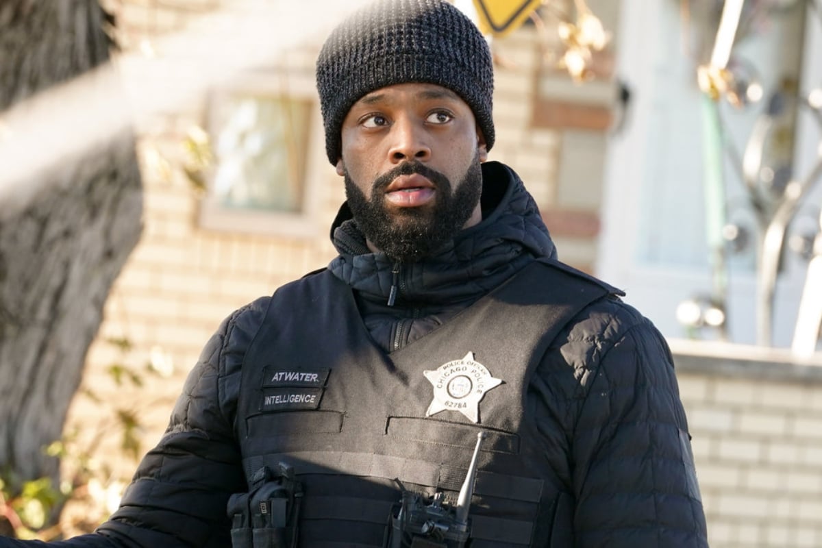 LaRoyce Hawkins as Kevin Atwater in Chicago P.D. Season 9. Atwater wears a bullet-proof vest over his coat and a hat.