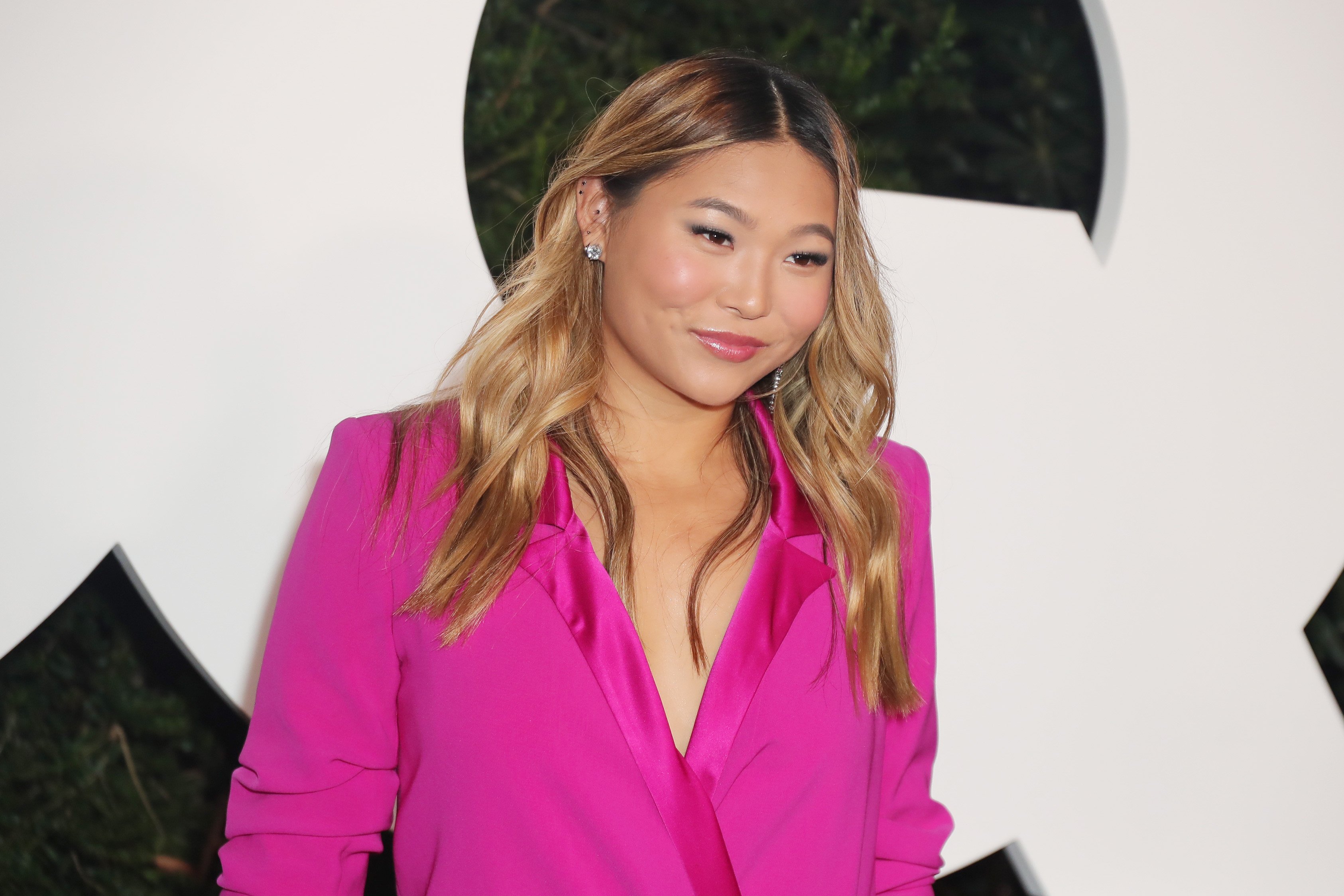 Chloe Kim dressed in a pink outfit at the GQ Men Of The Year Celebration