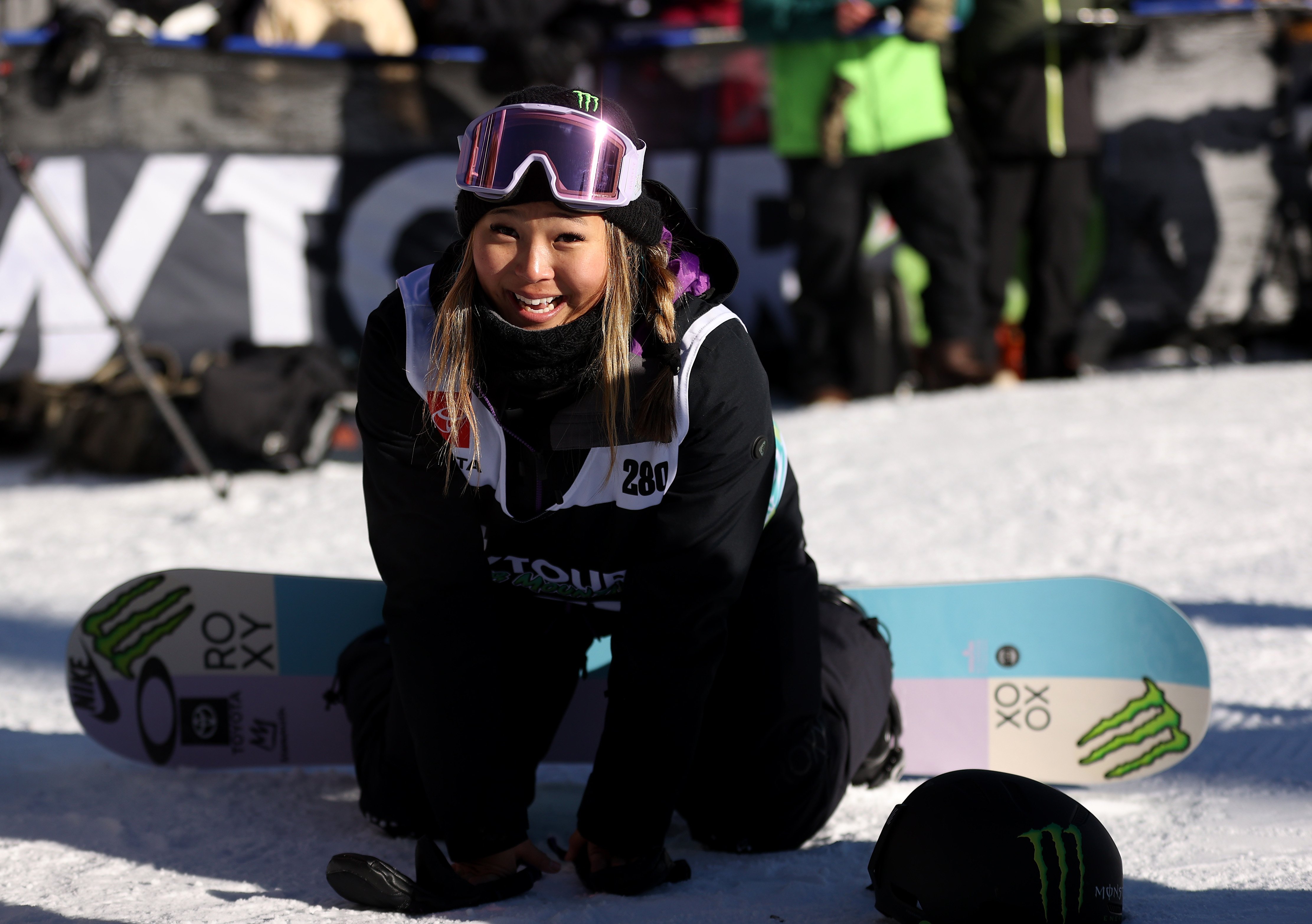 Chloe Kim smiles after her final run of the women's snowboard superpipe at the Dew Tour