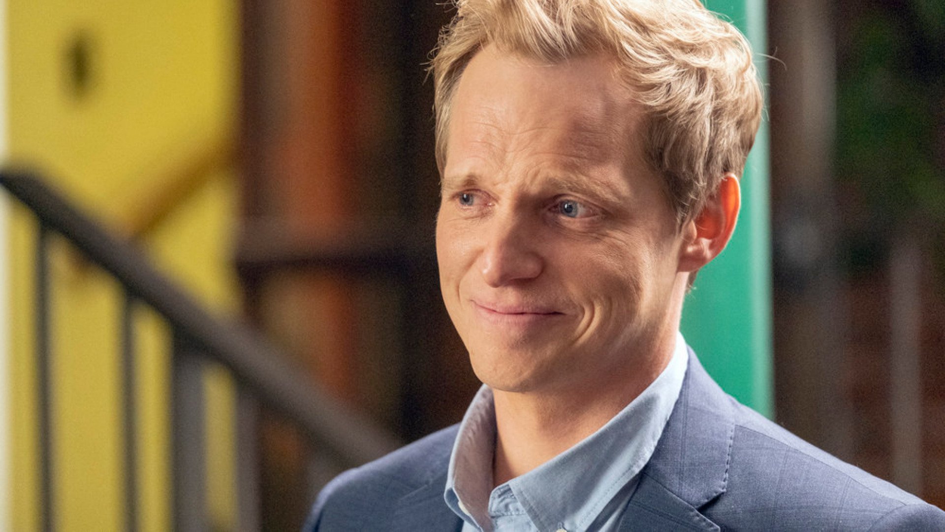Chris Geere as Phillip smiling at Kate in ‘This Is Us’ Season 6 Episode 3