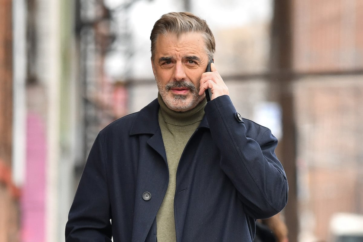 Chris Noth talks on the phone.