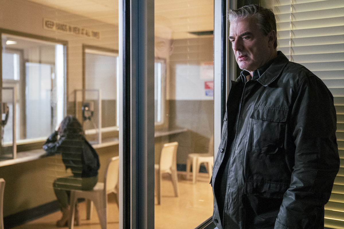 Chris Noth, standing in profile in a prison visiting room, in an episode of 'The Equalizer'