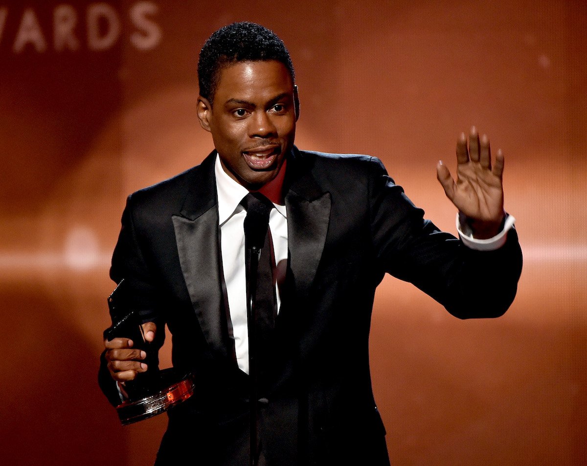 Chris Rock accepts an award.