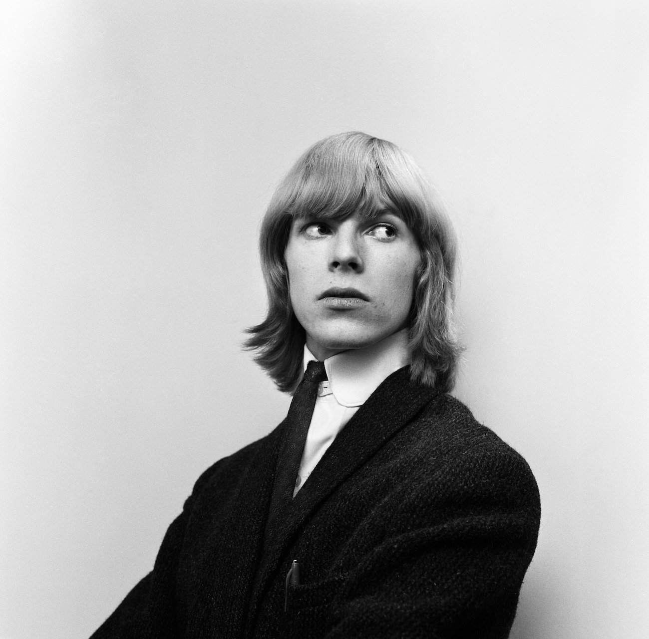 David Bowie in a suit at the BBC in 1965.