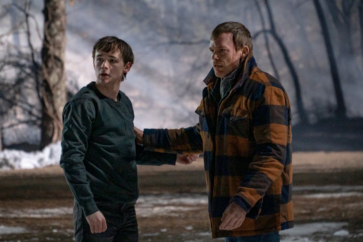 'Dexter: New Blood' Harrison and Dexter hold each other's arms in the woods
