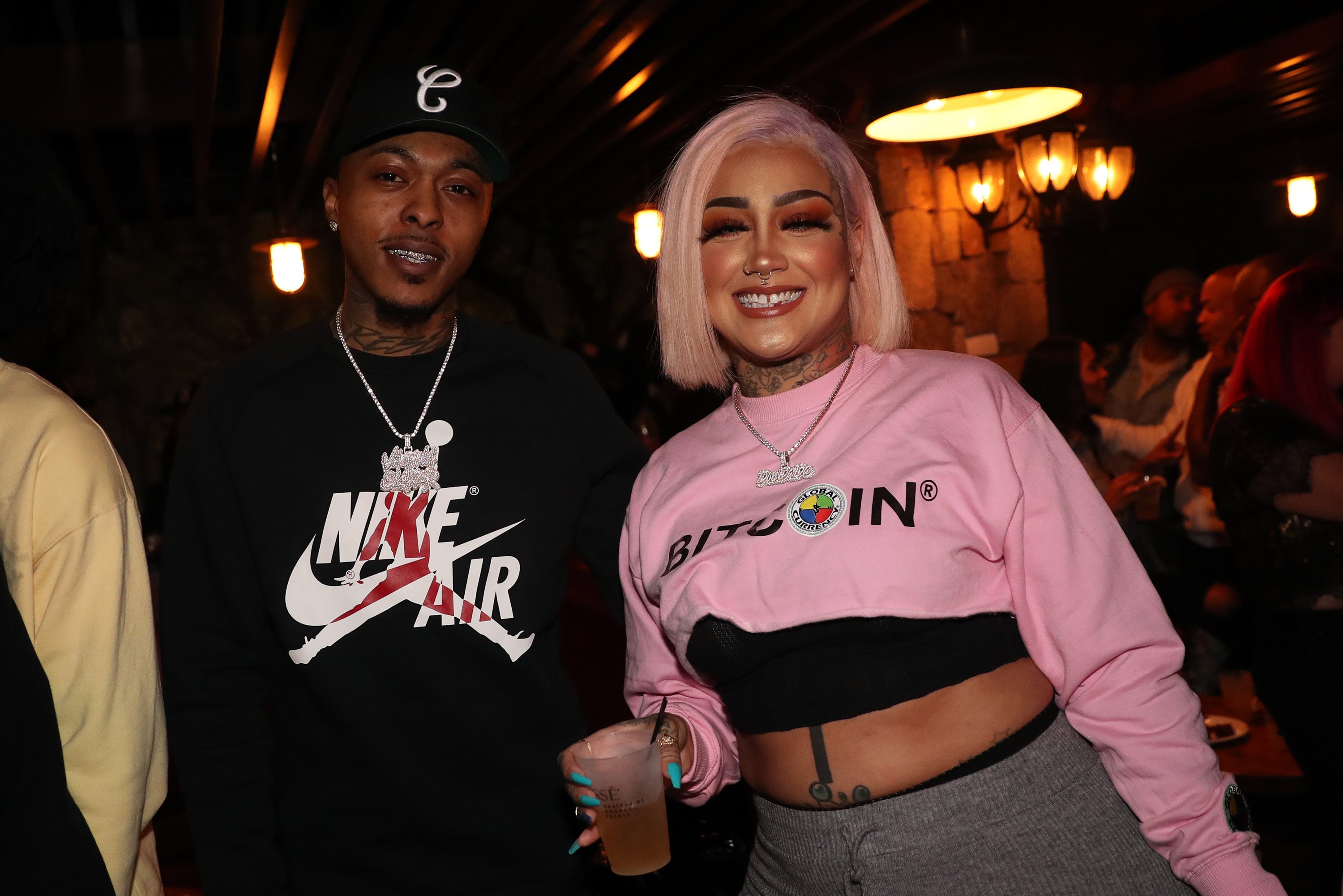 Alex the Vagina Slayer (L) and Donna Marie Lombardi smiling with Angela Yee at her birthday party