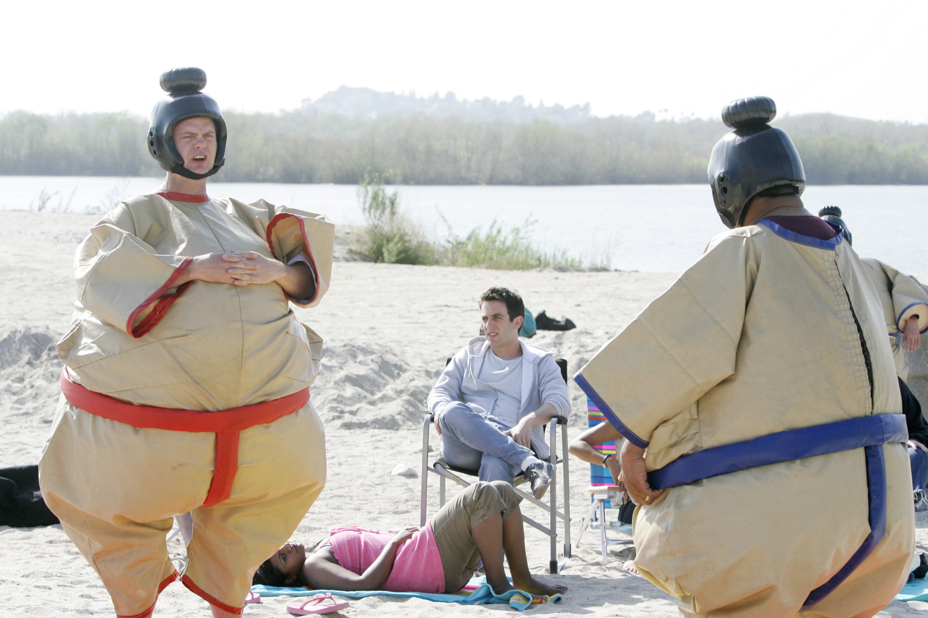 Rainn Wilson as Dwight Schrute and Leslie David Baker as Stanley Hudson wearing sumo costumes in 'The Office' episode 'Beach Games'