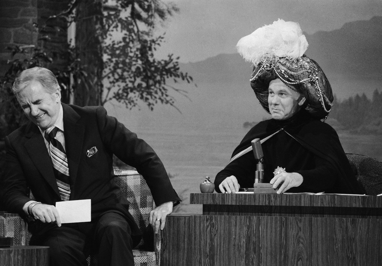 Ed McMahon laughs at Johnny Carson as Carnac the Magnificent