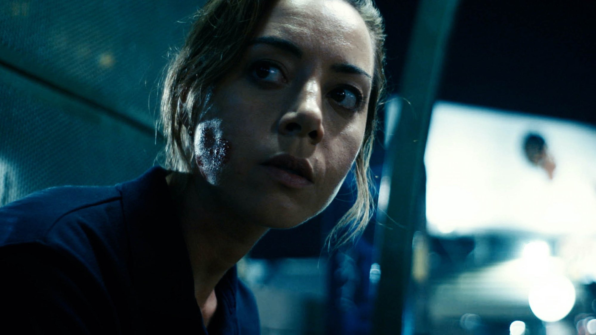 'Emily the Criminal' Aubrey Plaza as Emily with blood on her cheek