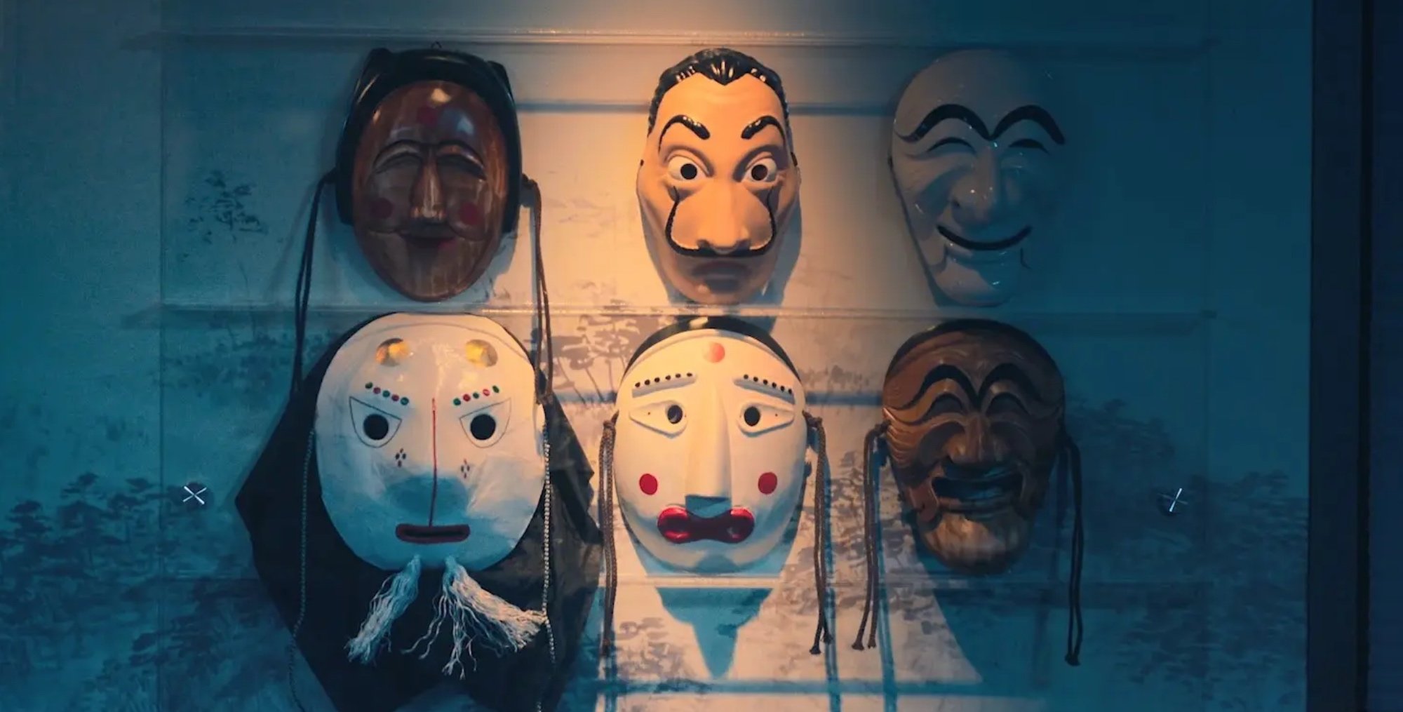 Face masks from 'Money Heist: Korea - Joint Economic Area' K-drama on a wall.