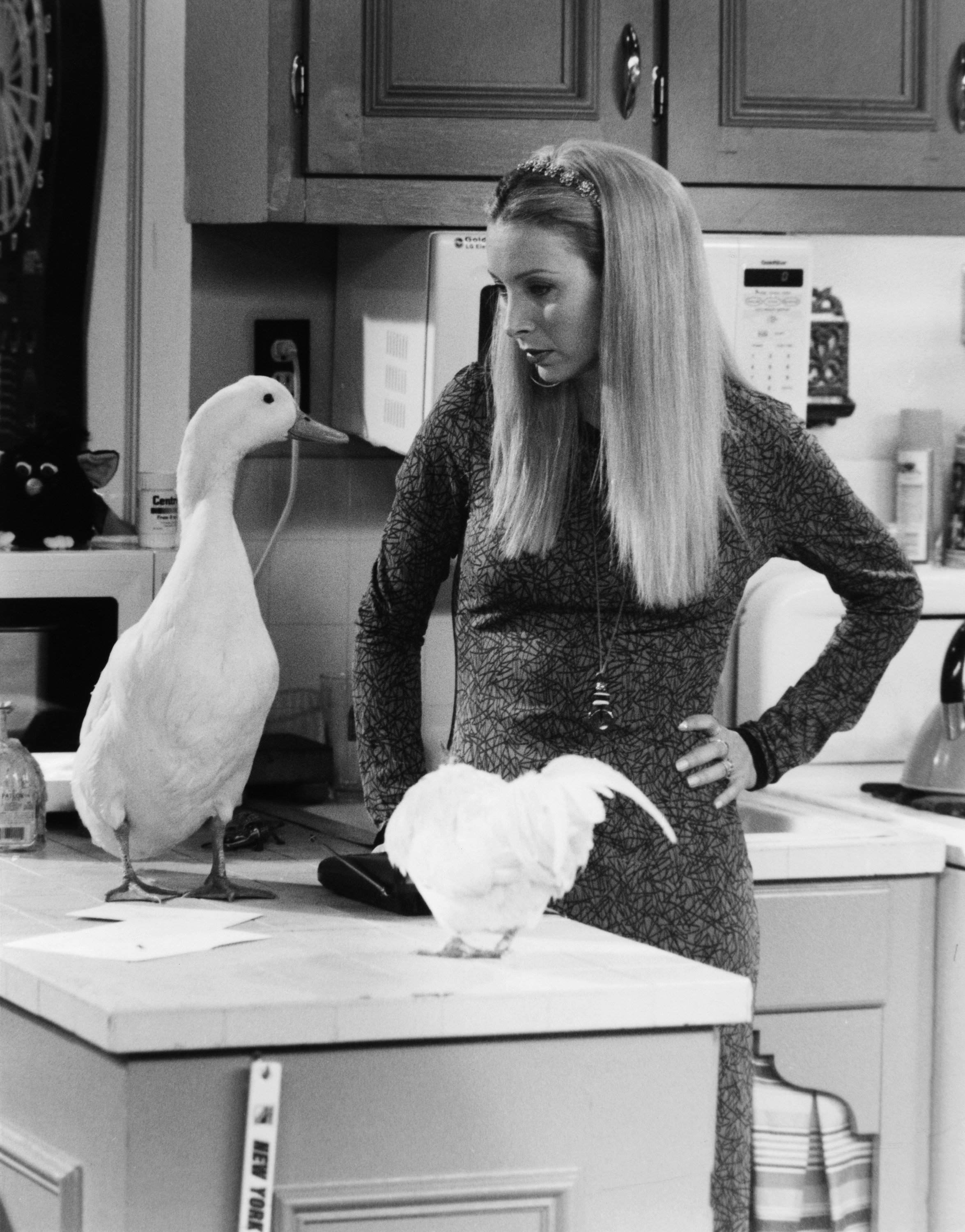 Lisa Kudrow talks to the Chick and the Duck during the filming of 'Friends'