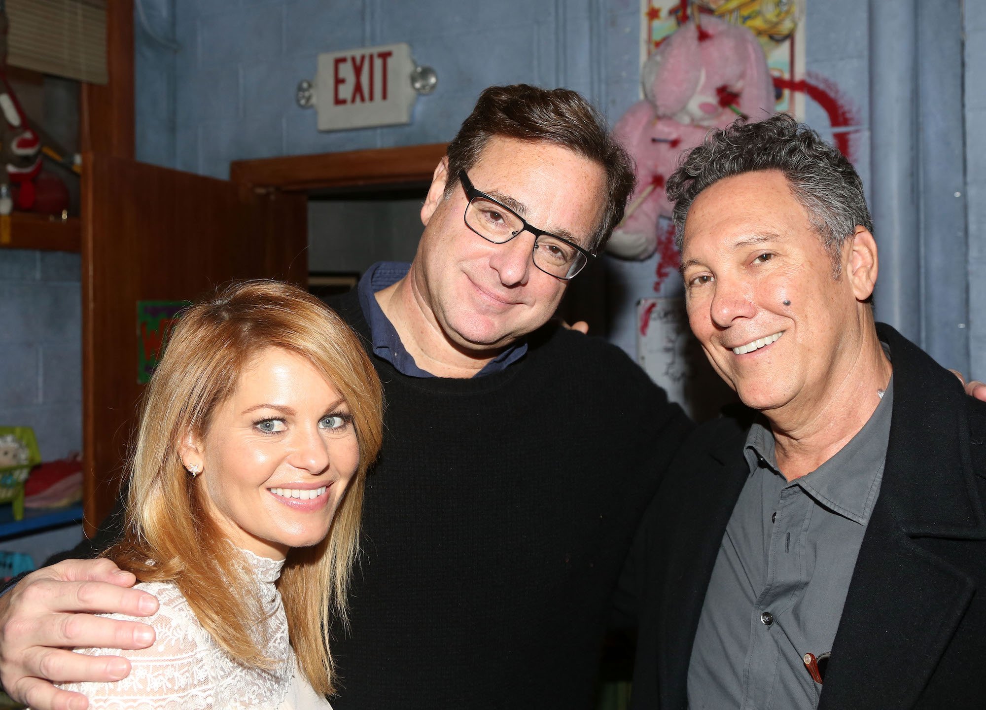 'Full House' stars Candace Cameron Bure and Bob Saget stand with 'Full House' creator Jeff Franklin