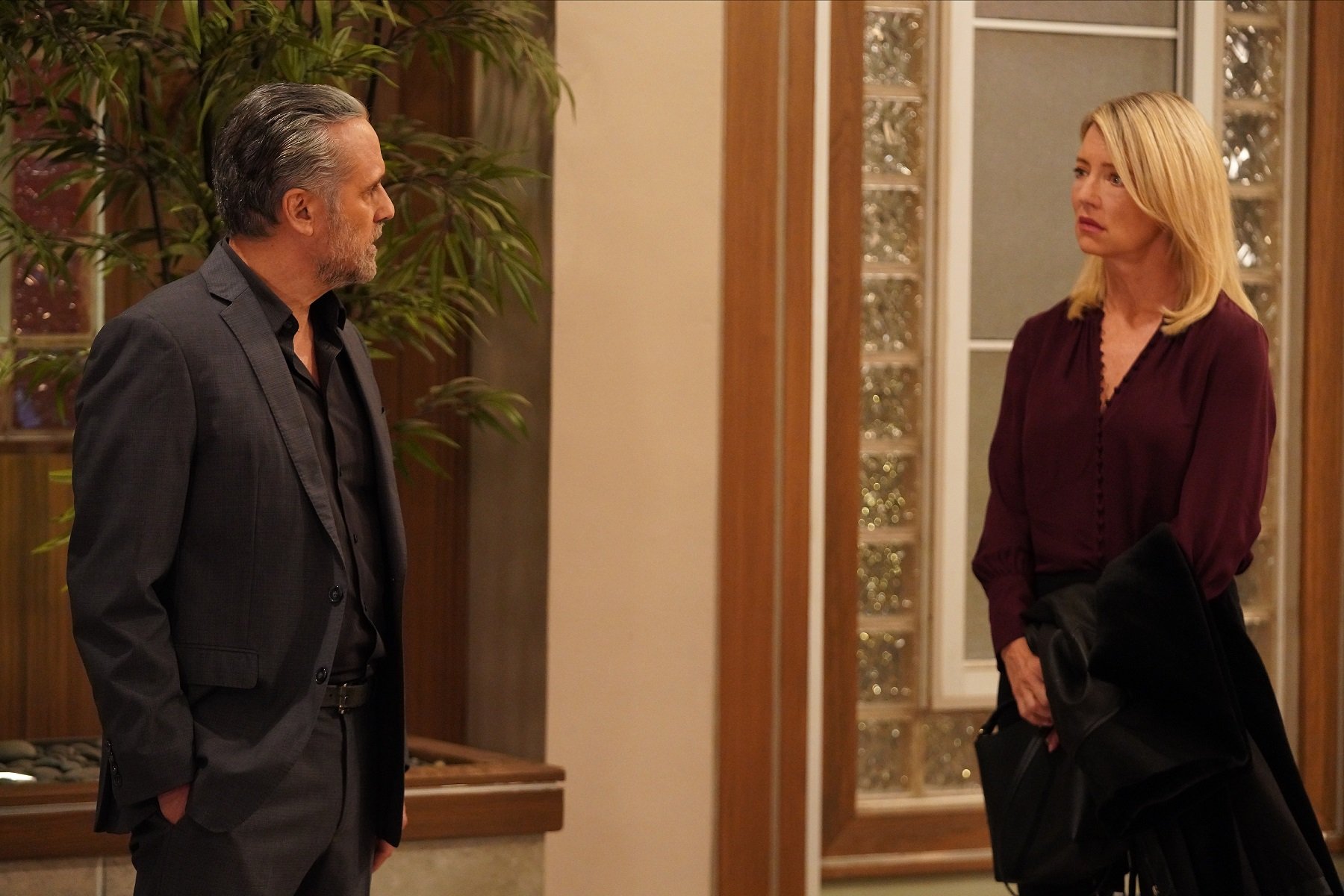 General Hospital sneak peek focuses on Sonny, pictured here in a grey suit, and Nina, pictured here in a red shirt and black pants