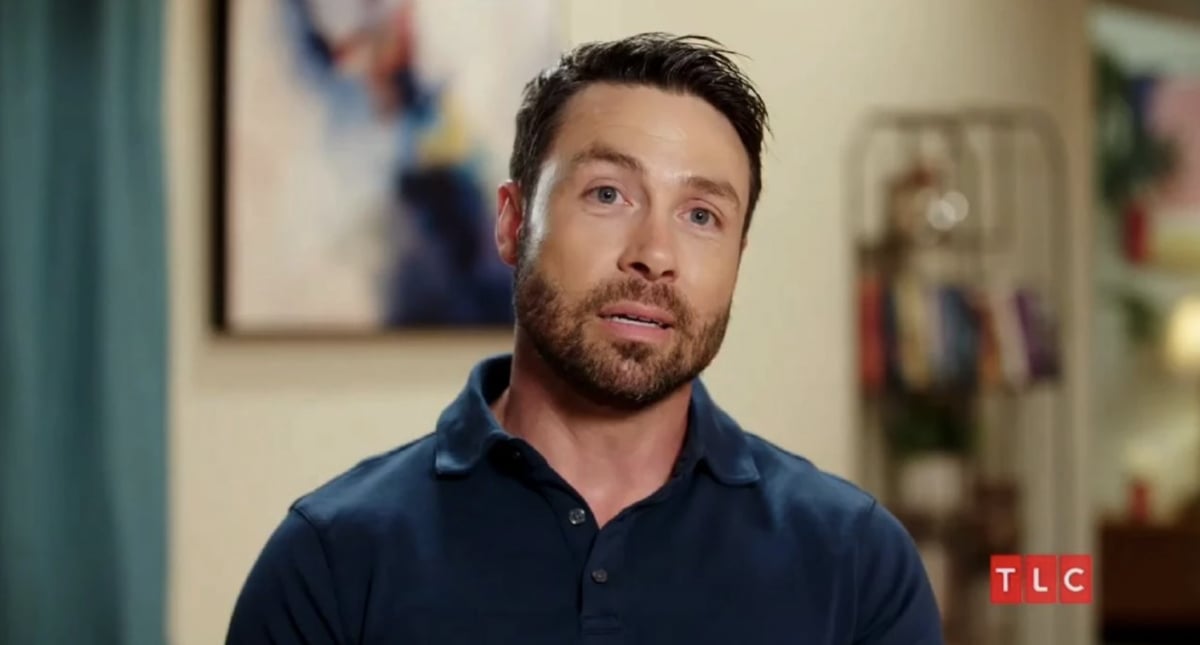 Geoffrey Paschel wearing a navy blue polo during a confessional of '90 Day Fiancé: Before the 90 Days' Season 4 on TLC.