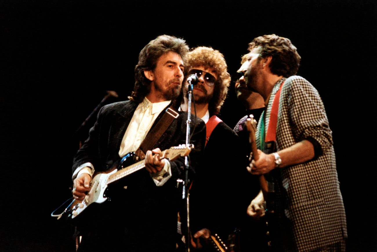 George Harrison, Jeff Lynne, Elton John, and Eric Clapton performing at the Princes Trust Concert in London, 1987.
