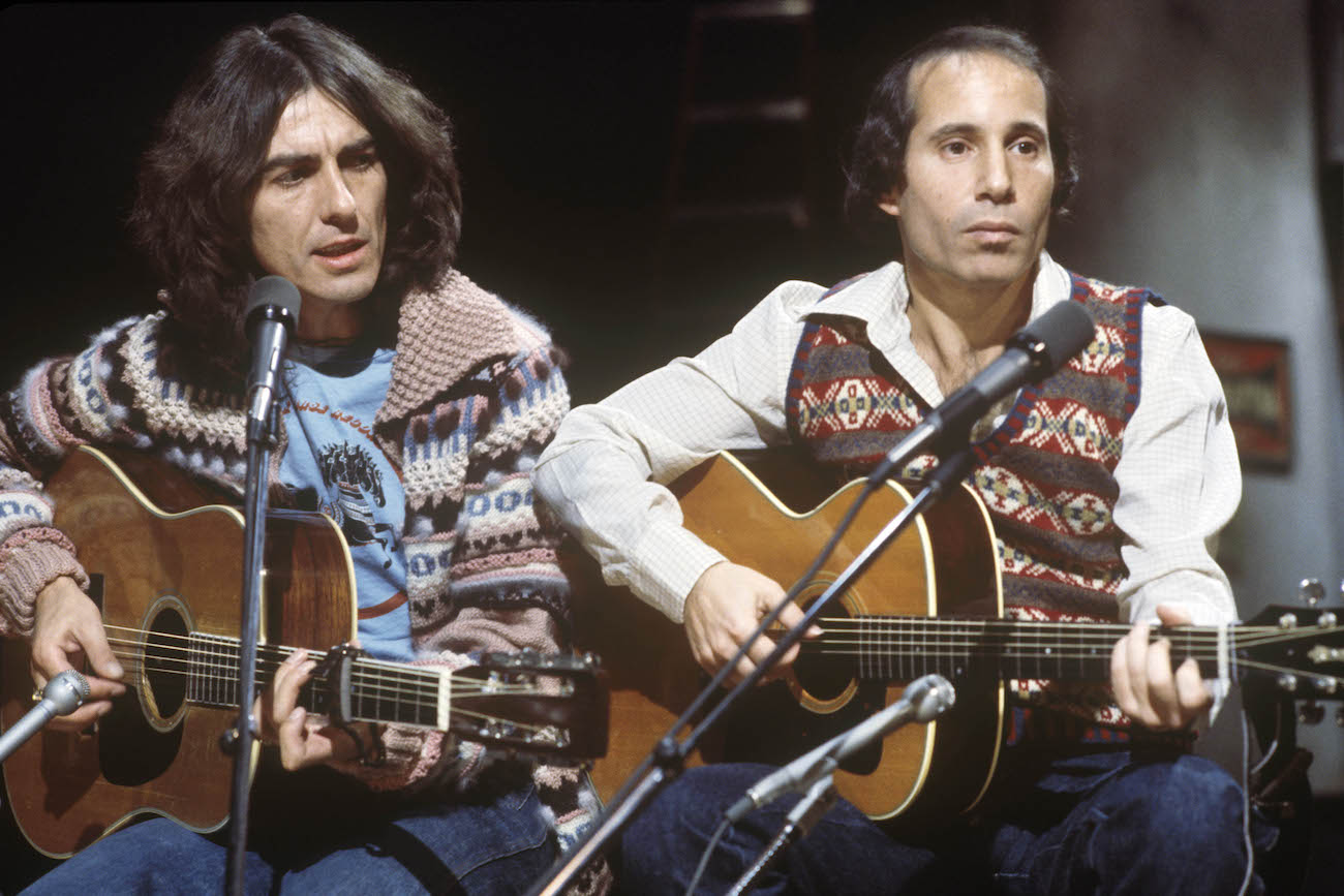 George Harrison and Paul Simon performing together on 'Saturday Night Live' in 1976.