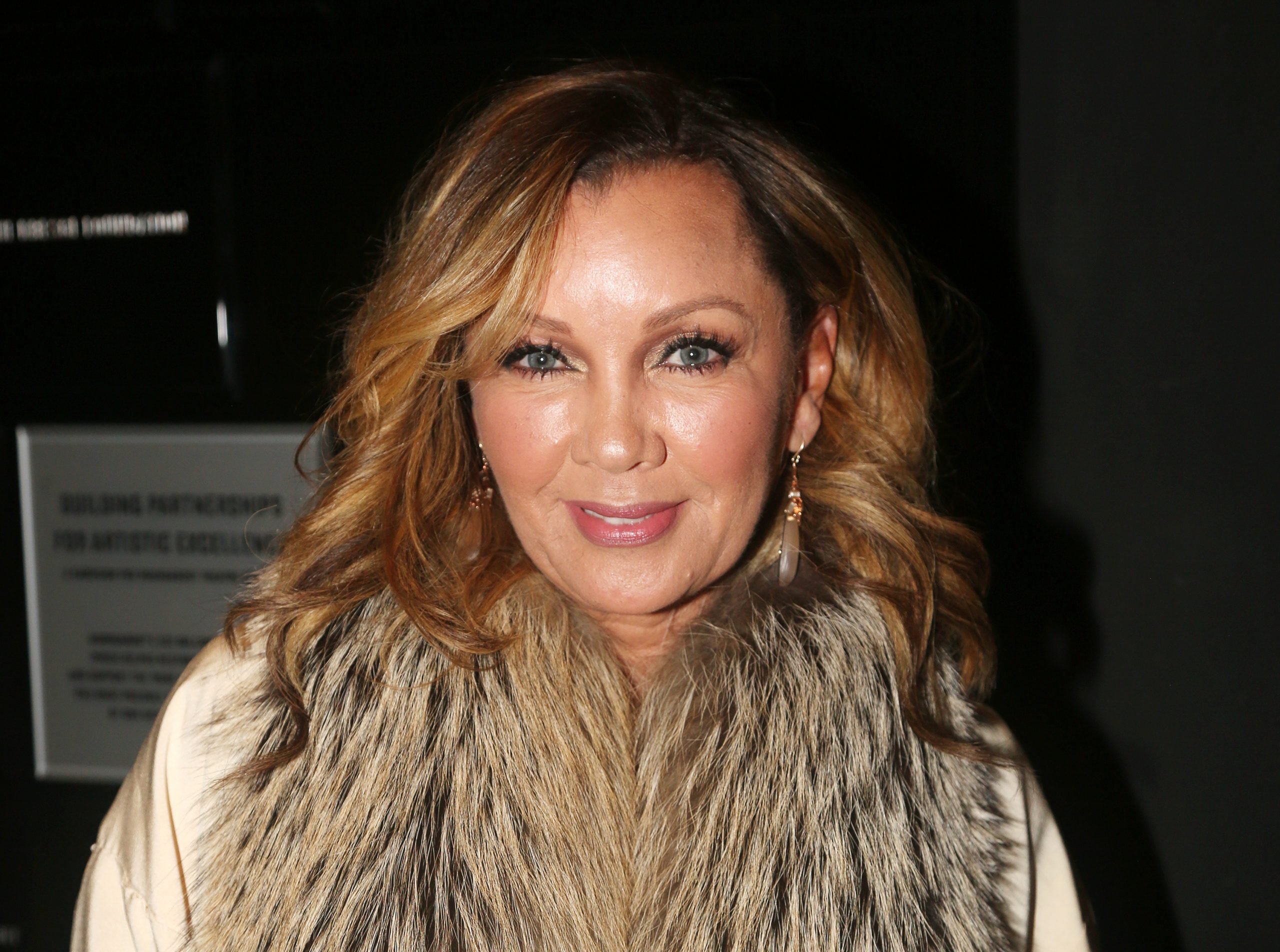 Vanessa Williams wearing a fur jacket