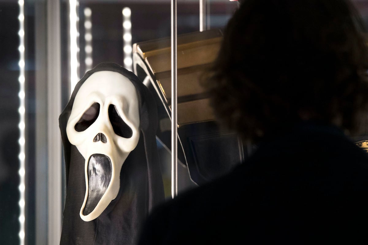 A Ghostface mask used in ‘Scream’ sits in a display case