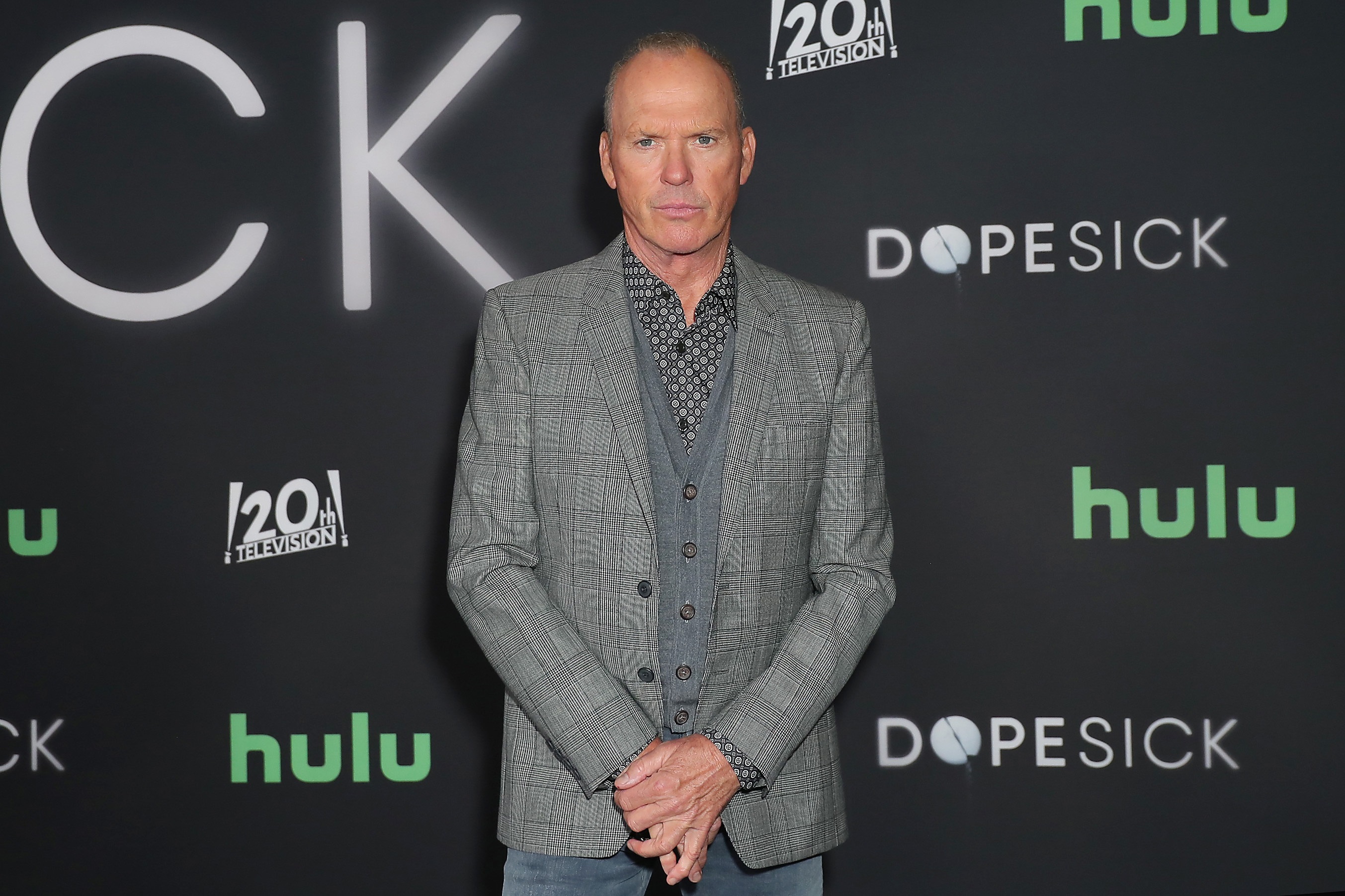 Michael Keaton posing for photographers at the 'Dopesick' premiere