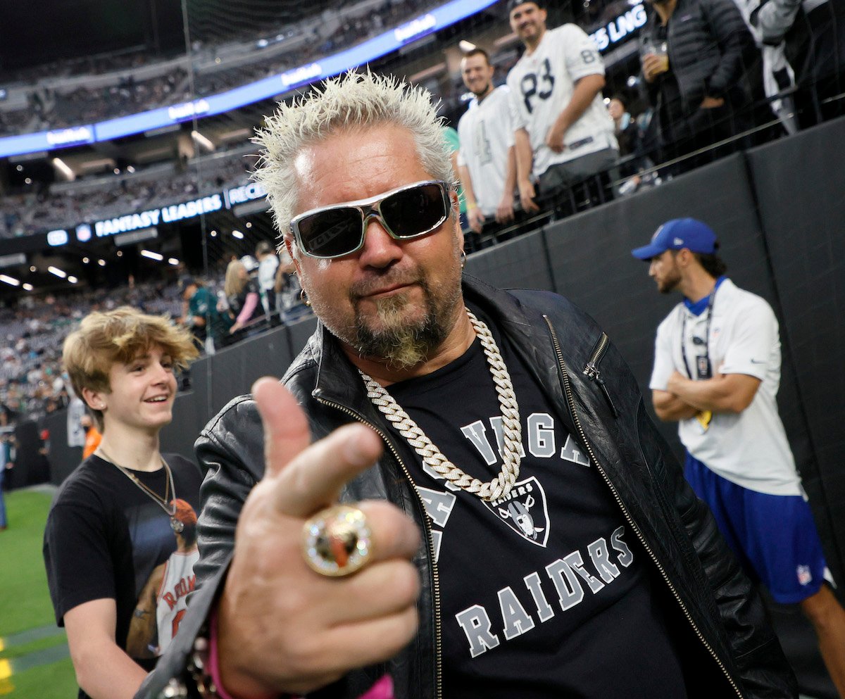 Chef and television personality Guy Fieri attends an NFL game