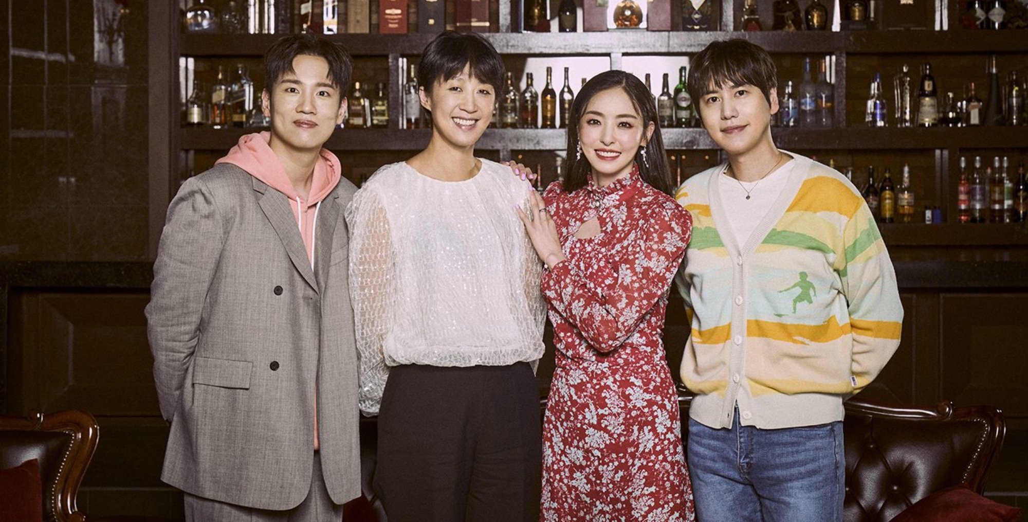 Hanhae, Hong Jin-kyung, Lee Da-hee, and Kyuhyun as hosts for 'Single's Inferno' standing next to each other smiling.