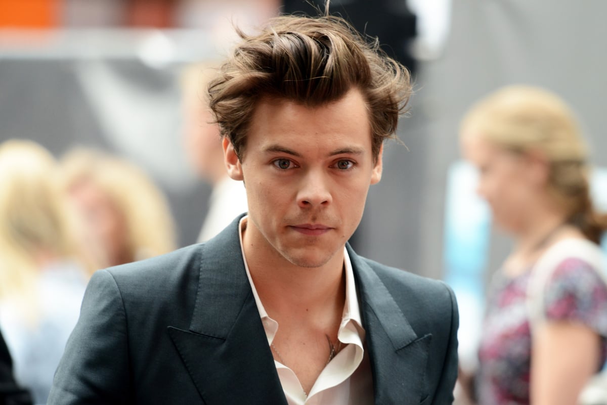 Harry Styles wearing a shirt with a white collar and suit participates in the world premiere of "Dunkirk" at Odeon Leicester Square on July 13, 2017 in London, England