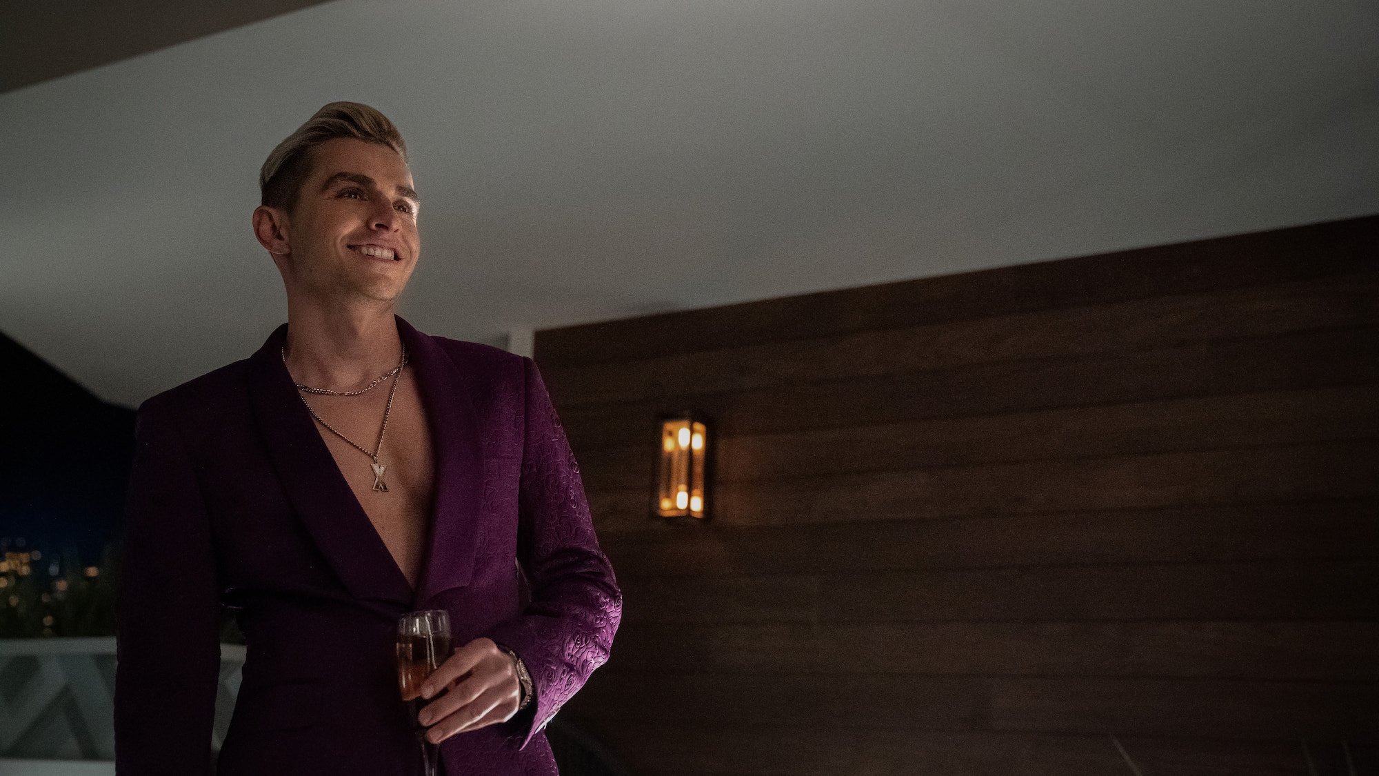 'Hungry Hungry Hippos' star Xavier (Dave Franco) holds a glass of wine in 'The Afterparty'