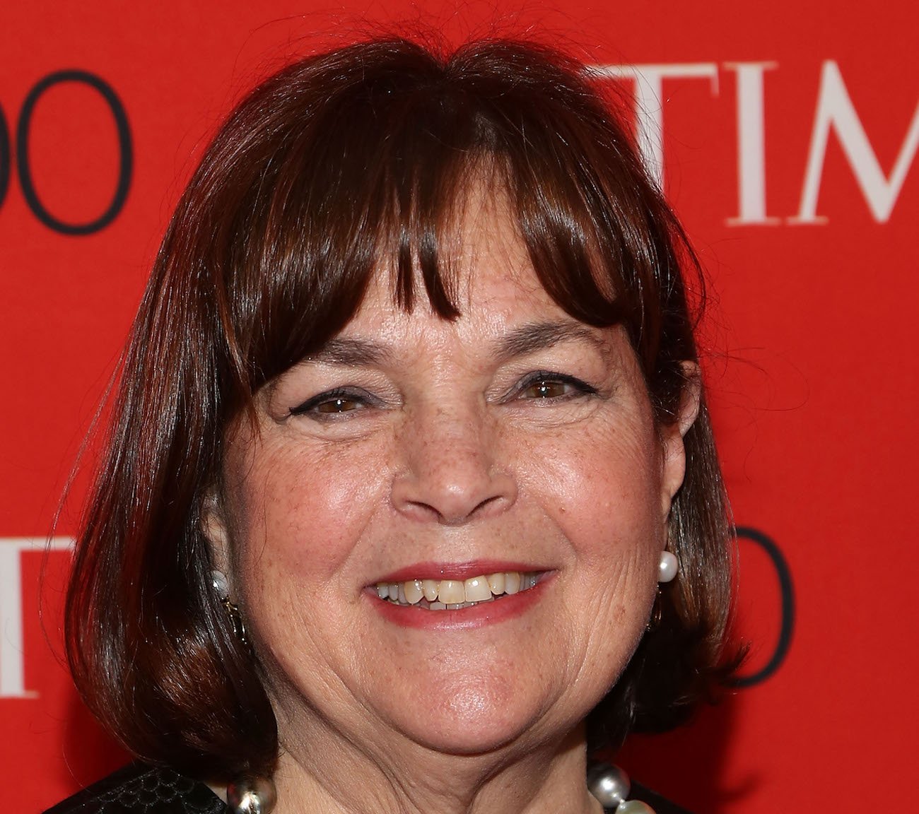 Ina Garten smiles as she poses for cameras at the 2015 Time 100 Gala