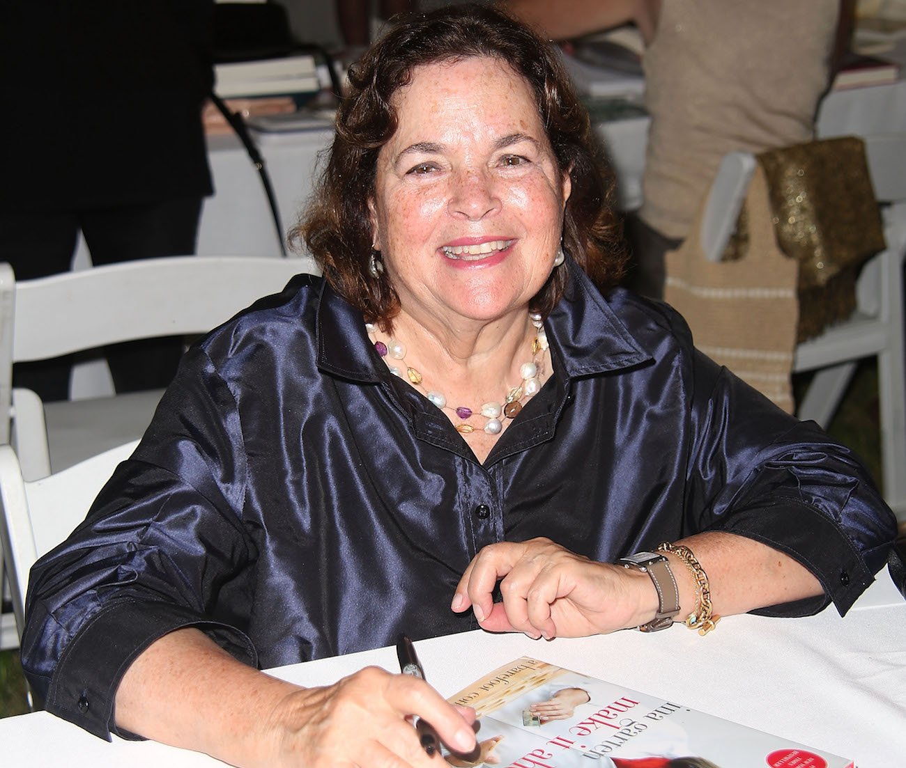 Ina Garten smiles wearing a black shirt