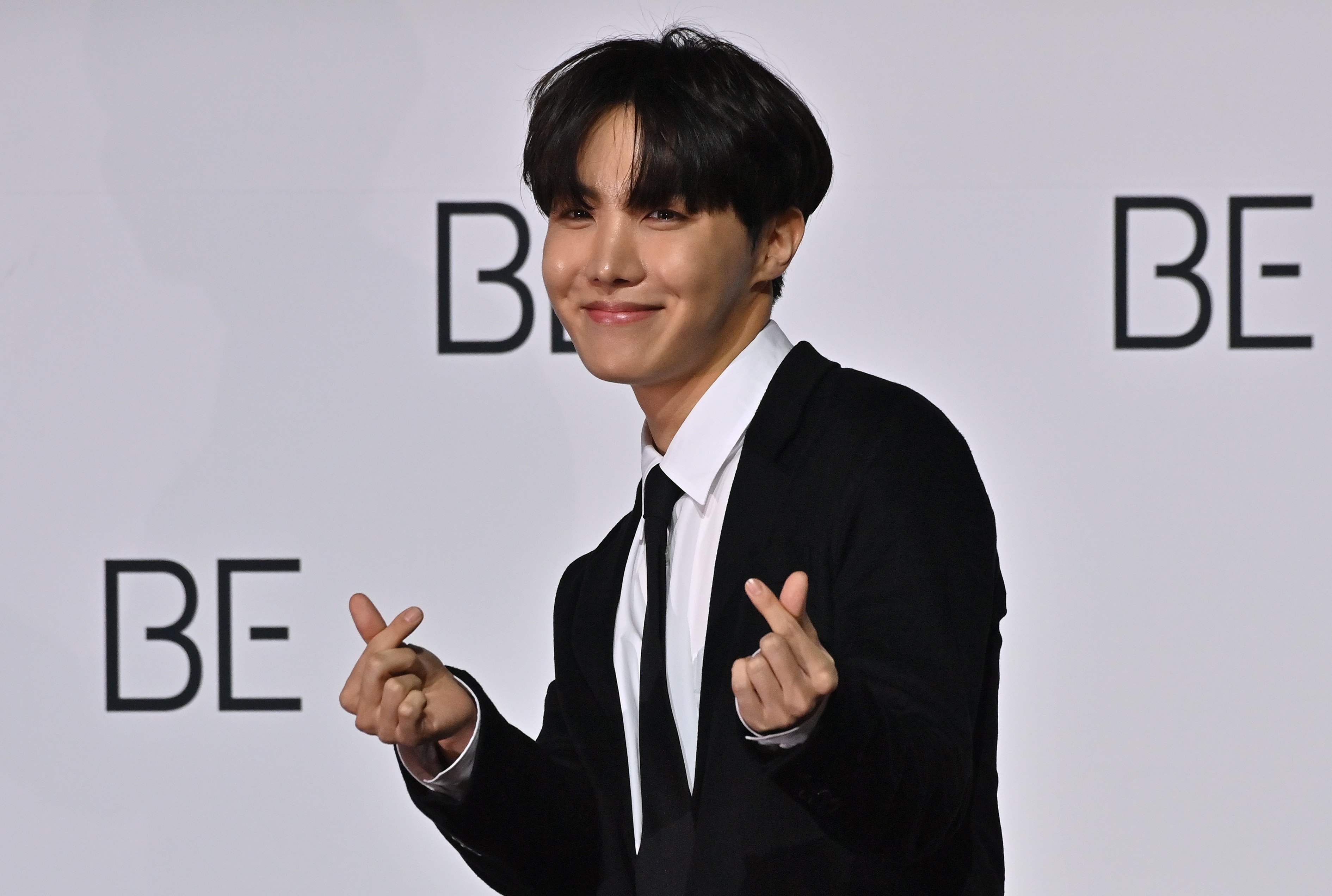 K-pop boy band BTS member, J-Hope, poses for a photo session during a press conference on BTS new album 'BE (Deluxe Edition)'