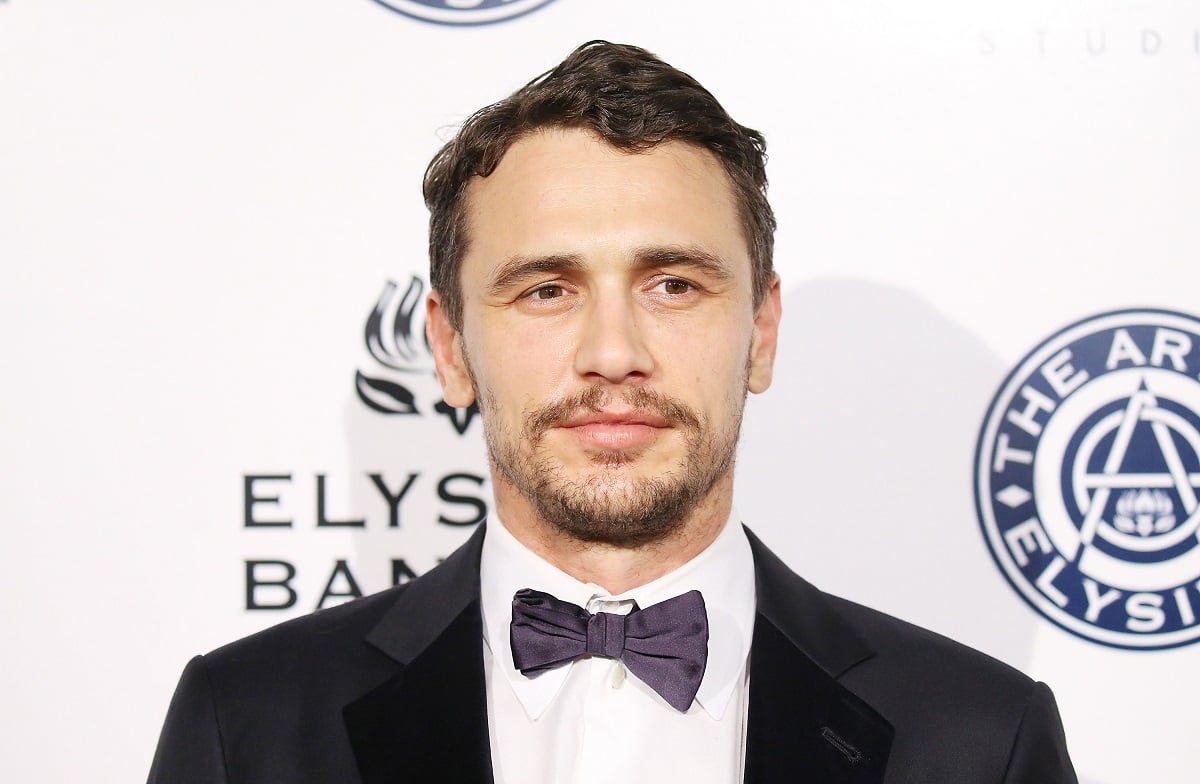 James Franco posing in a suit