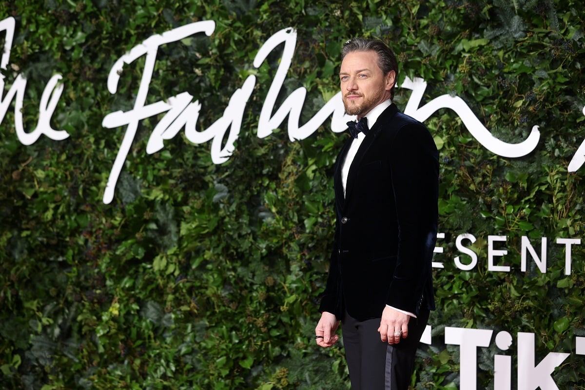 James McAvoy posing in a suit.