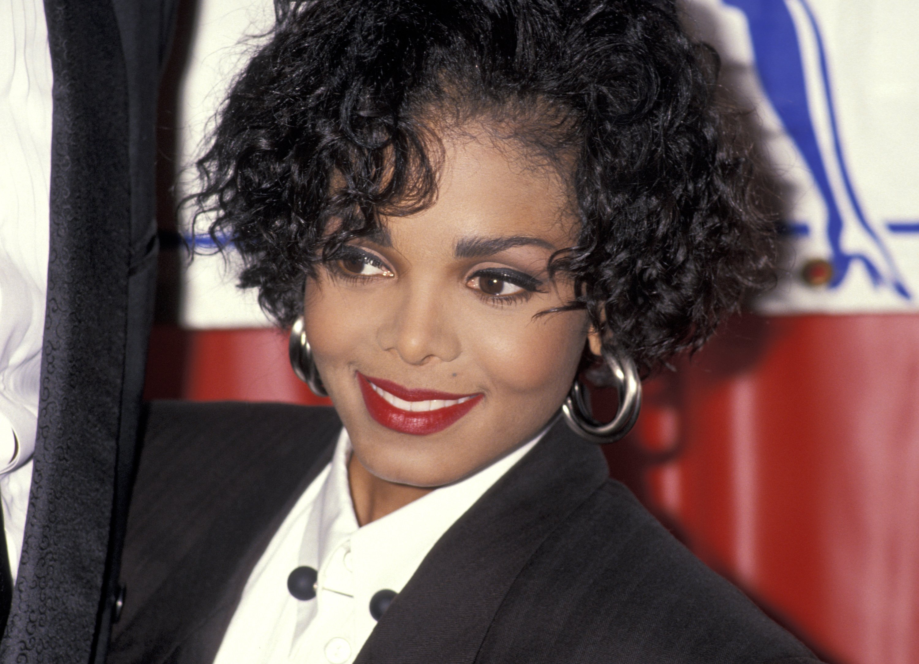 Janet Jackson wearing a suit