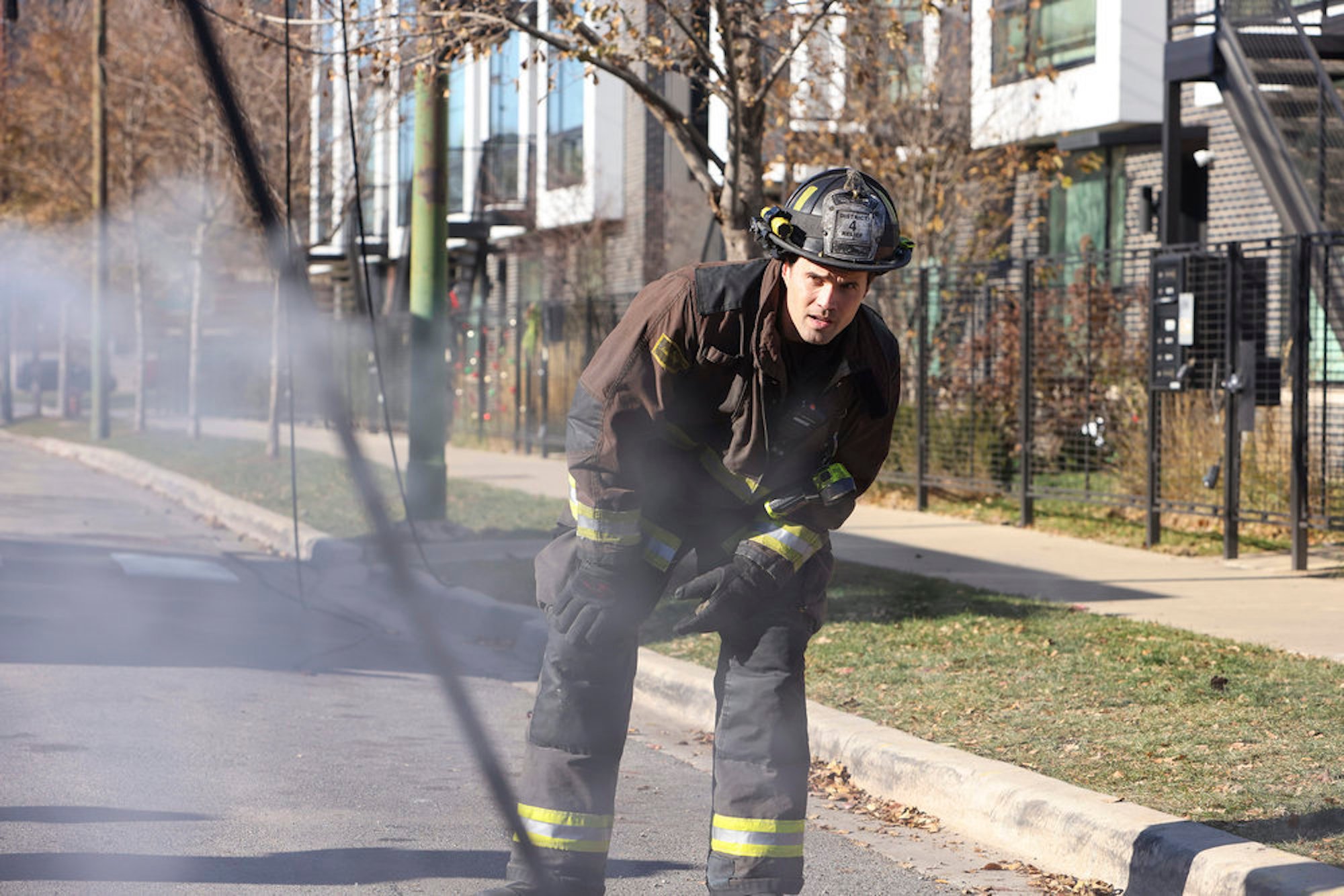 Brett Dalton as Jason Pelham in firefighting gear in 'Chicago Fire' Season 10