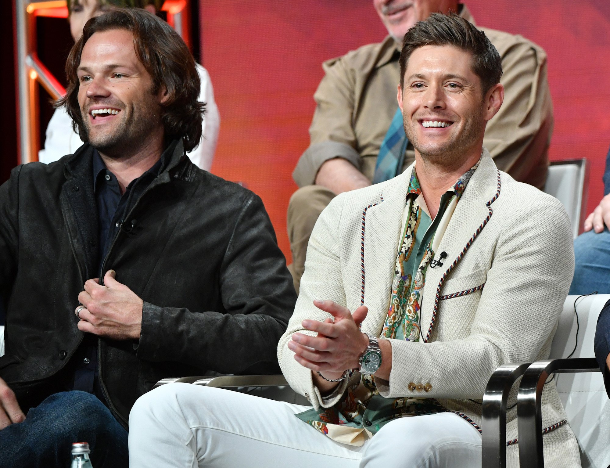 Jensen Ackles and Jared Padalecki sit on the stage for the final 'Supernatural' TCA panel