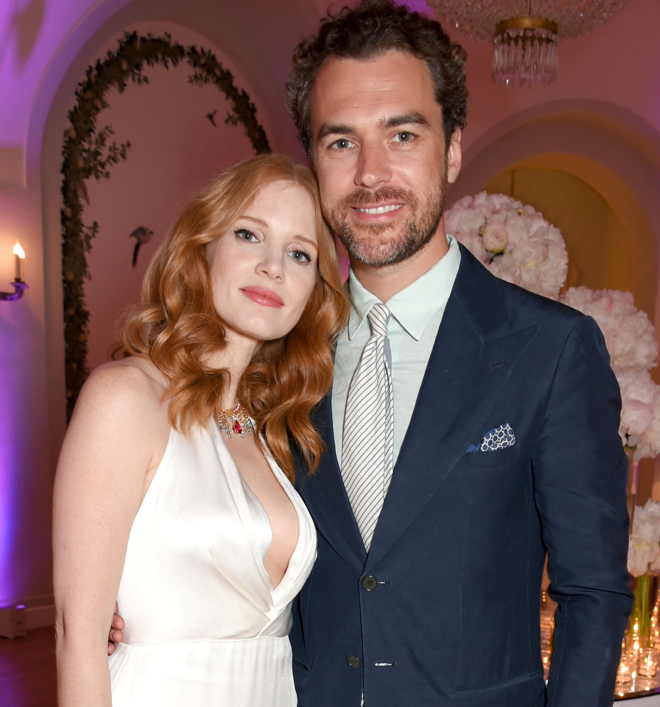 Jessica Chastain and Gian Luca Passi de Preposulo pose for a photo at a Vanity Fair and HBO Dinner