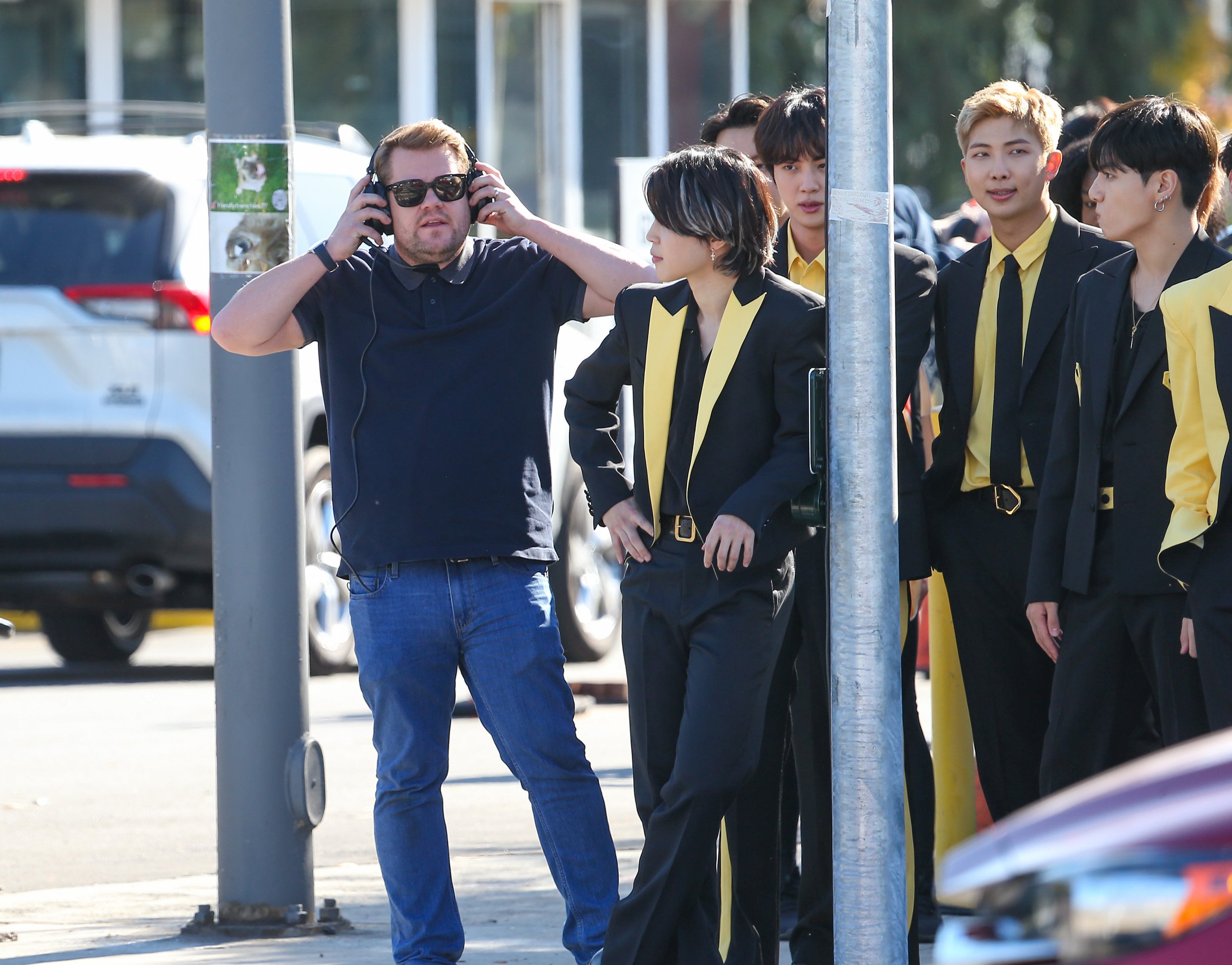 James Corden is seen with Jiman, Jin, RM and Jungkook of the K-Pop band BTS