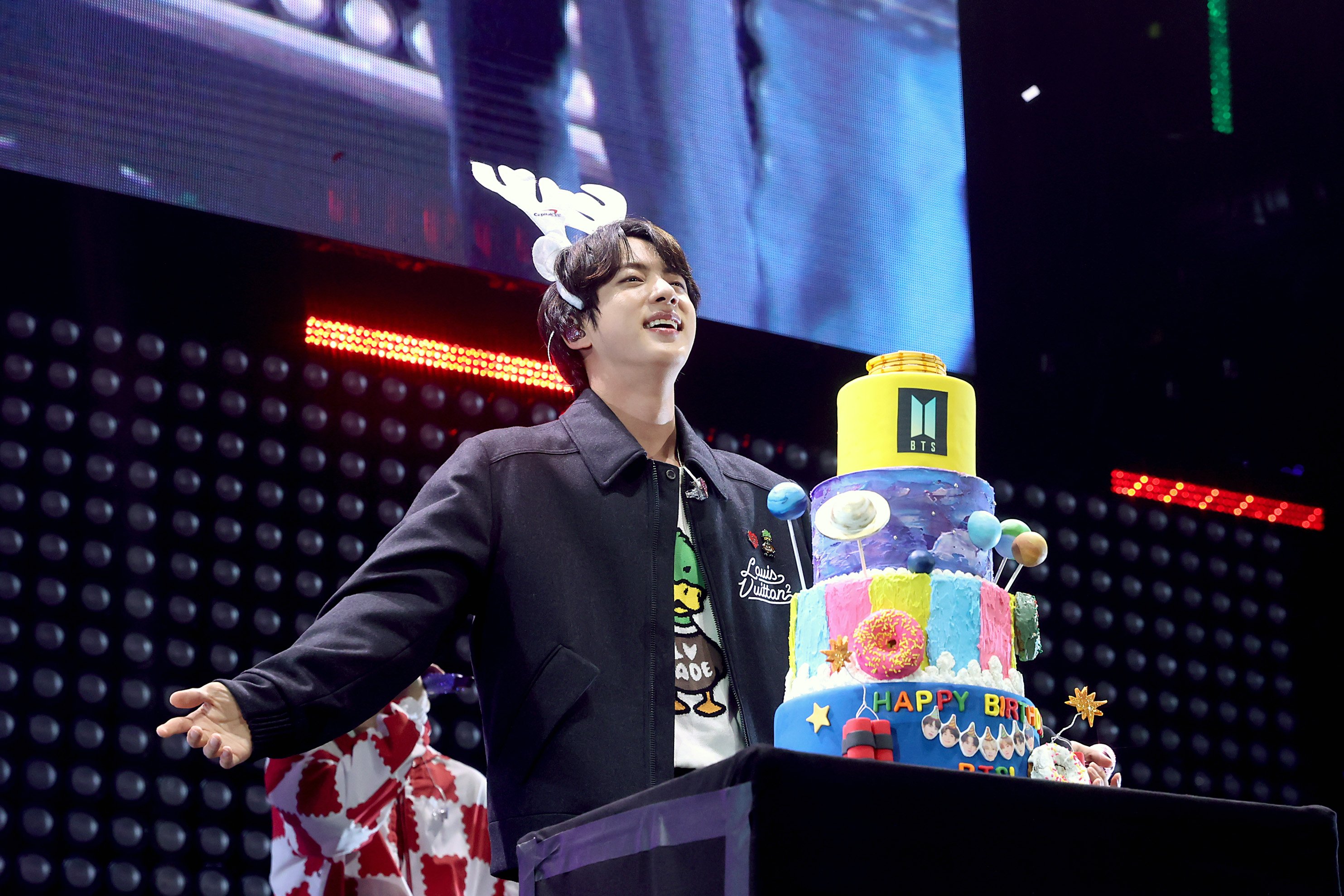 BTS sings 'Happy Birthday' to Jin as they perform on stage during iHeartRadio 102.7 KIIS FM's Jingle Ball 2021
