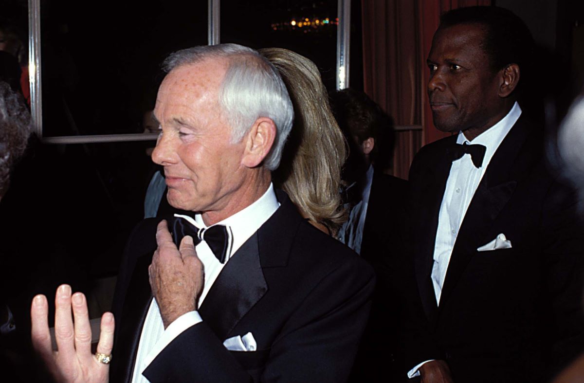 Johnny Carson in a black and white suit and bowtie