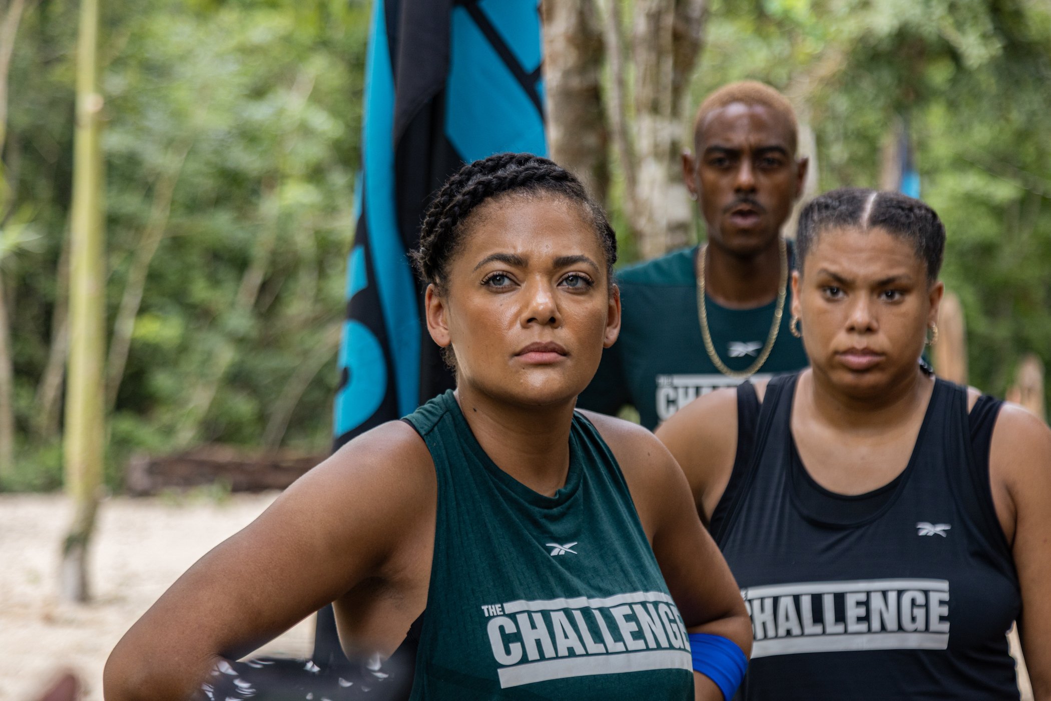 Jonna Mannion in 'The Challenge: All Stars' Season 2 standing in front of other competitors outdoors