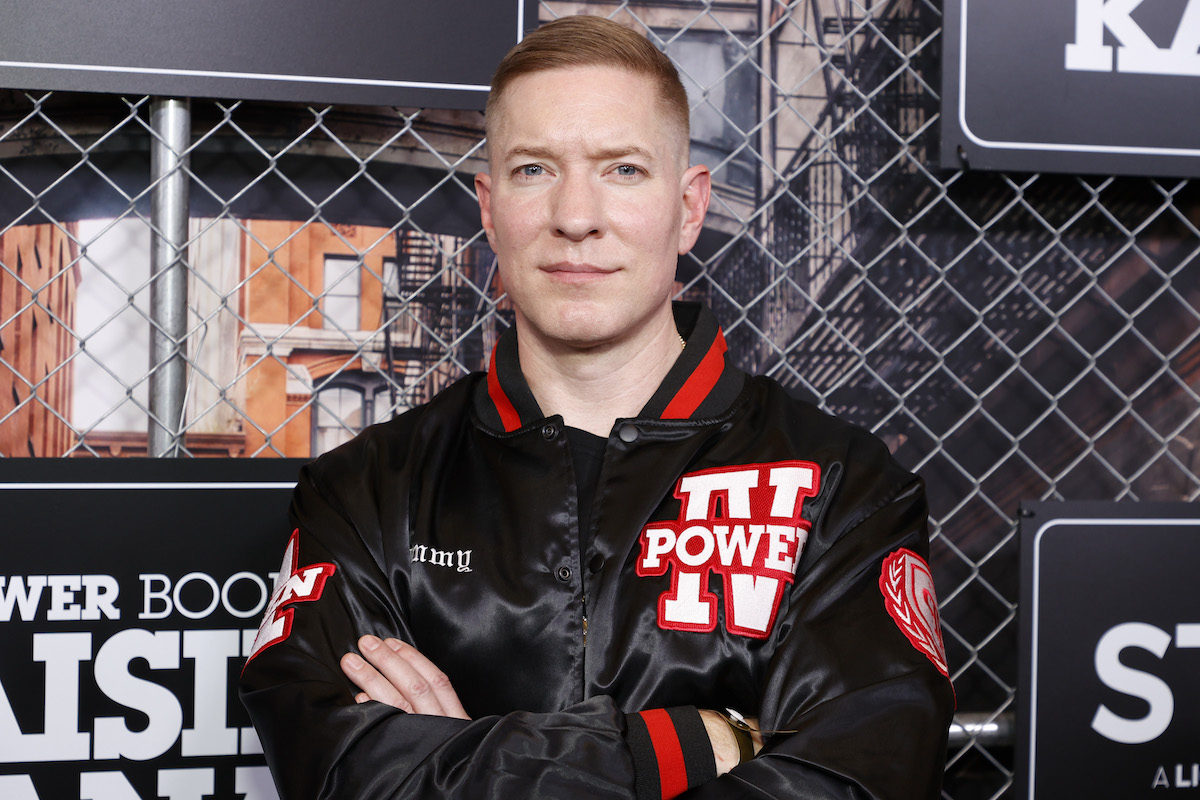 Joseph Sikora poses in a letterman jacket with a design for 'Power Book IV: Force'