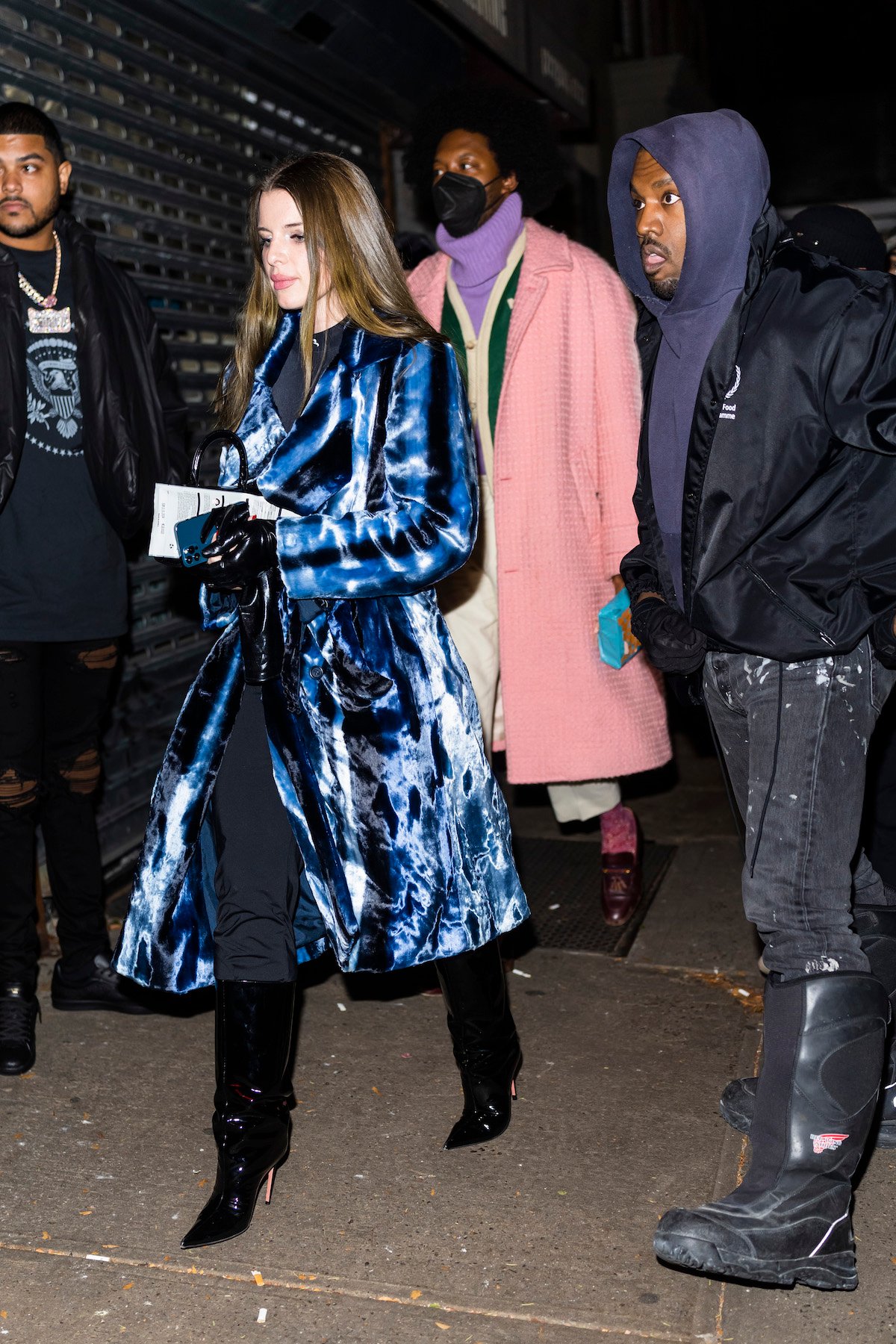 Julia Fox and Kanye West walk together on a date in New York.