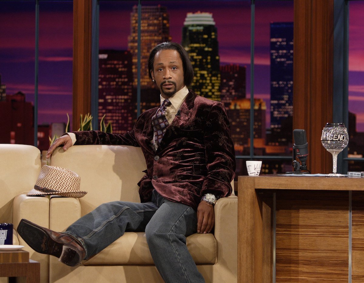 Katt Williams sitting in an armchair