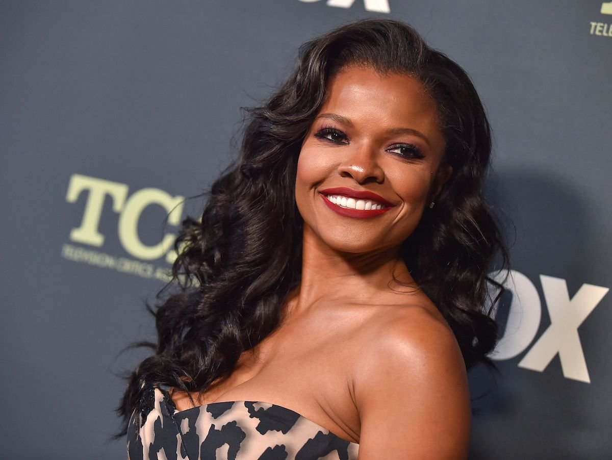 Actress Keesha Sharp arrives at the FOX Winter TCA All-Star Party wearing leopard print and red lipstick