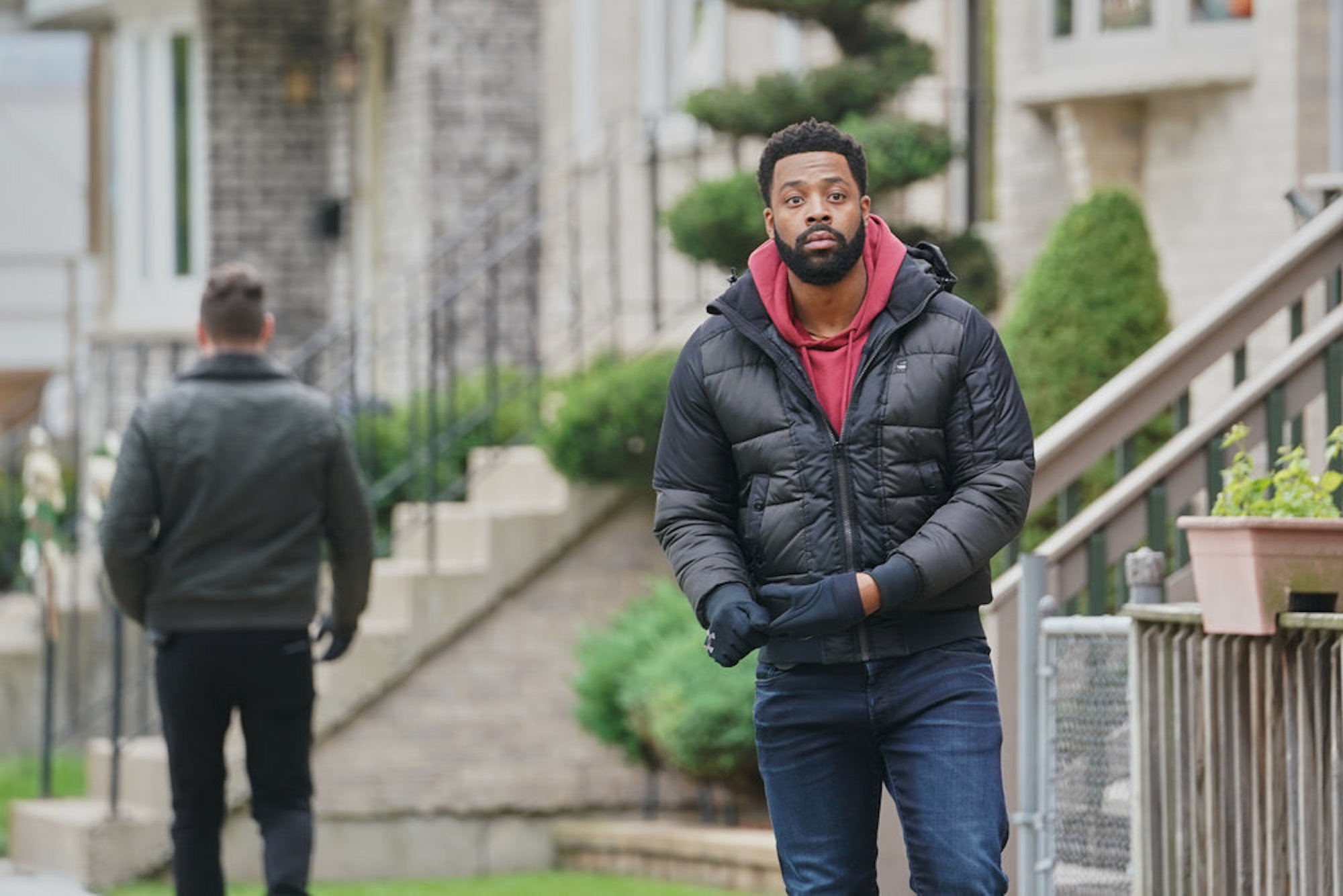 LaRoyce Hawkins as Kevin Atwater standing outside in 'Chicago P.D.' Season 9