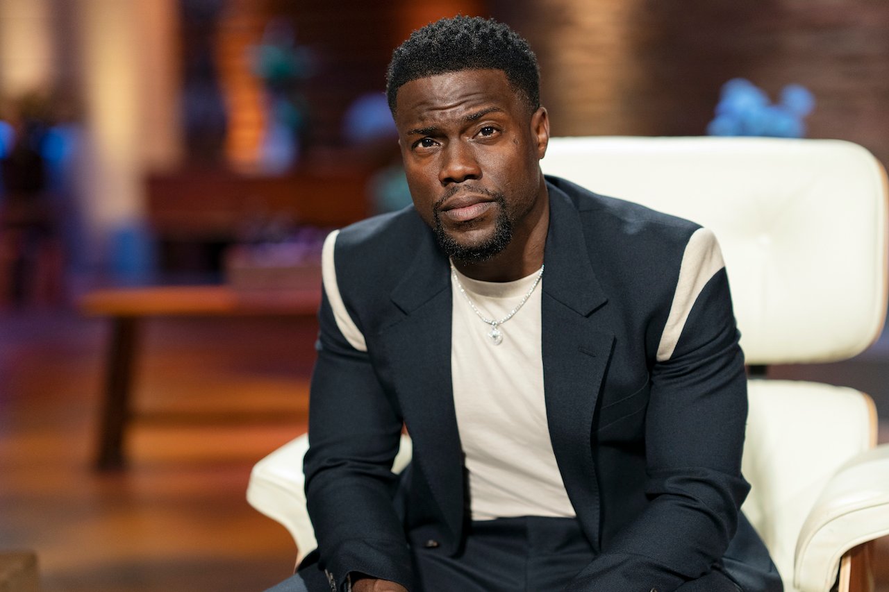 Kevin Hart sits in a chair and poses on 'Shark Tank'