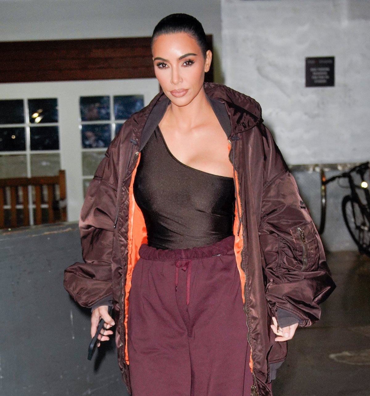 Kim Kardashian West is photographed walking down a street.